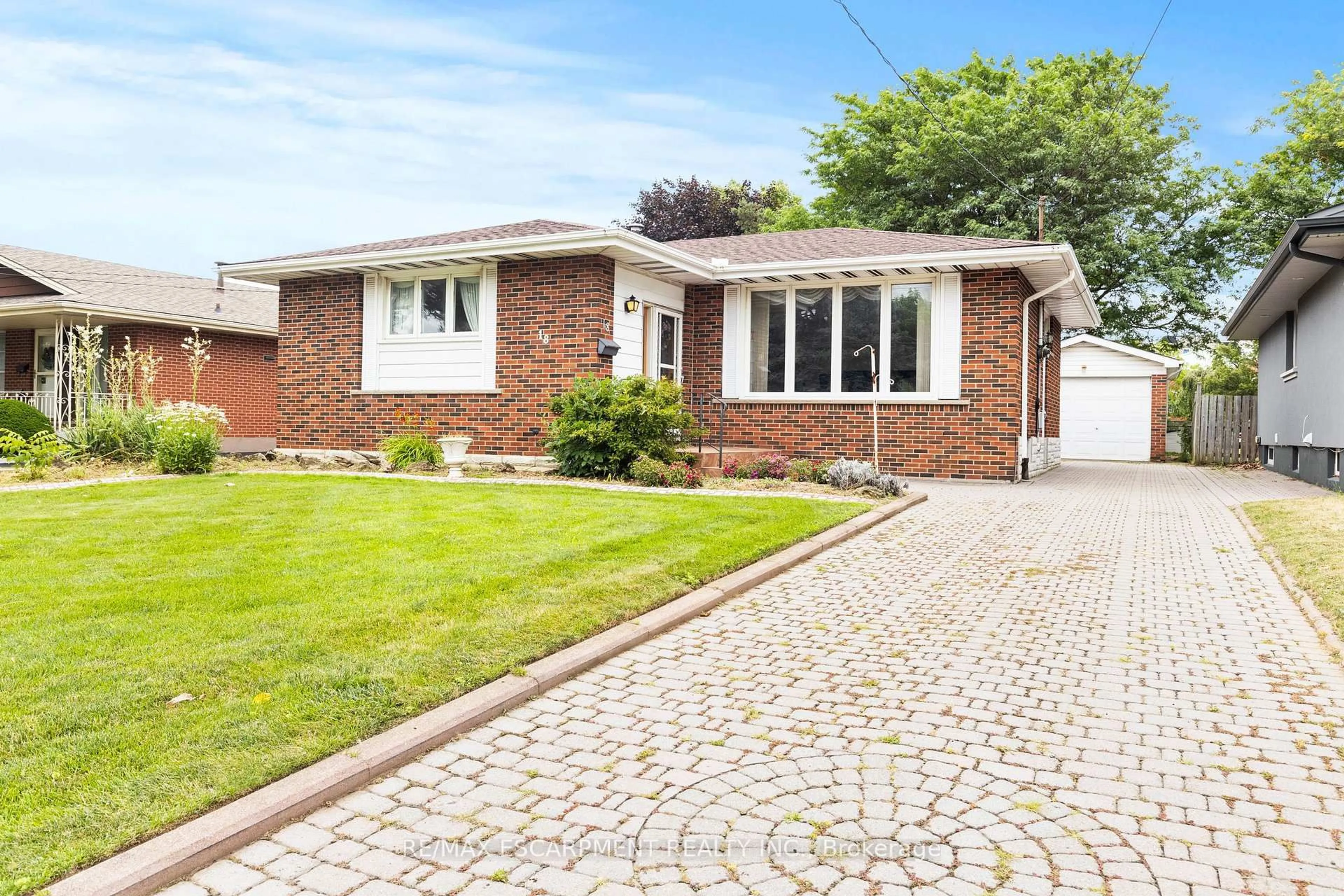 Home with brick exterior material, street for 18 Owen Pl, Hamilton Ontario L8G 2H2