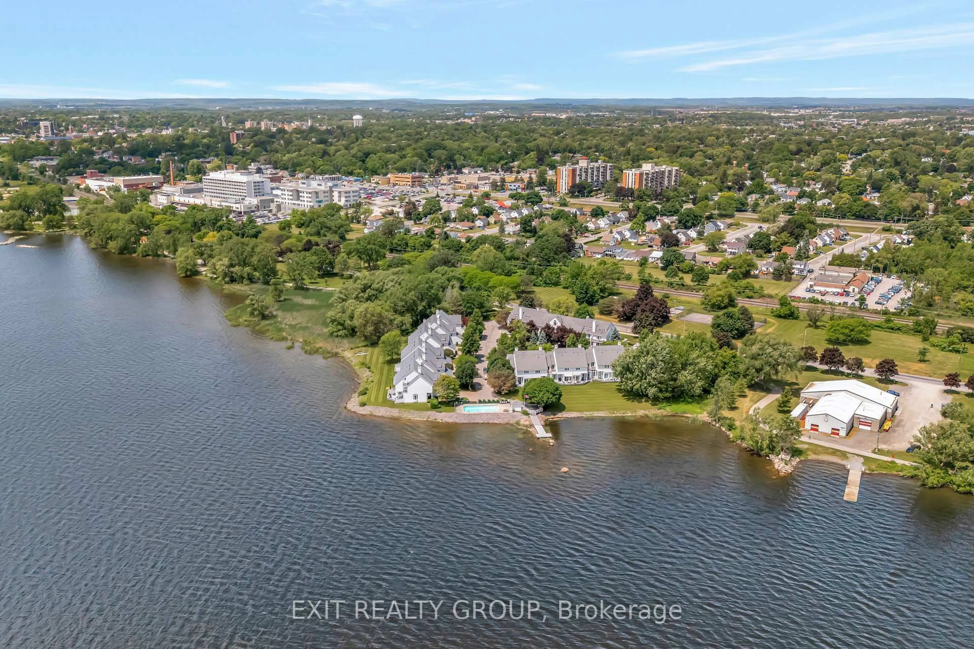 A pic from outside/outdoor area/front of a property/back of a property/a pic from drone, water/lake/river/ocean view for 31 Keegan Pkwy #13, Belleville Ontario K8N 5N7