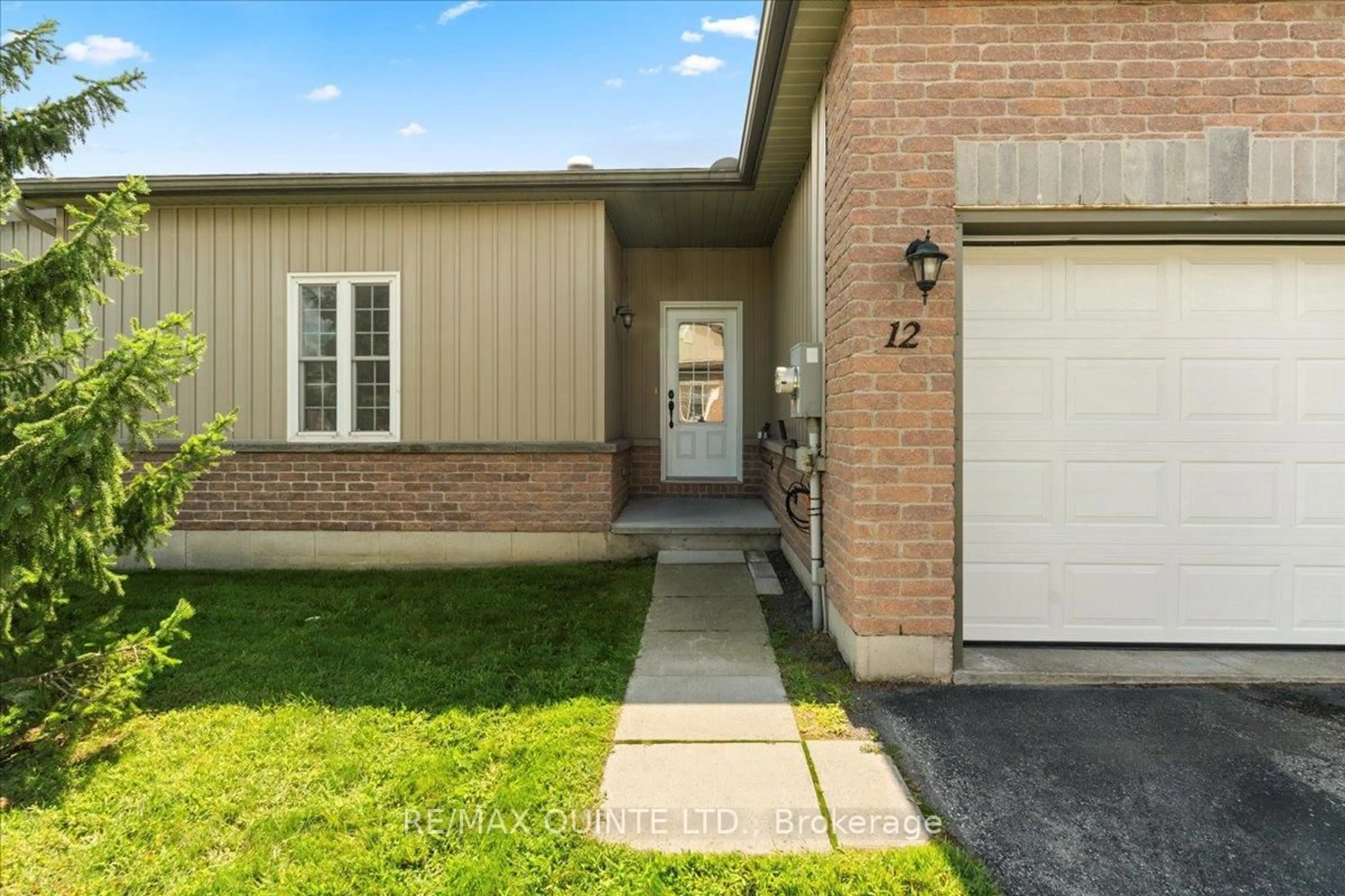 Home with brick exterior material, street for 1 Rosemary Crt #12, Prince Edward County Ontario K0K 2T0