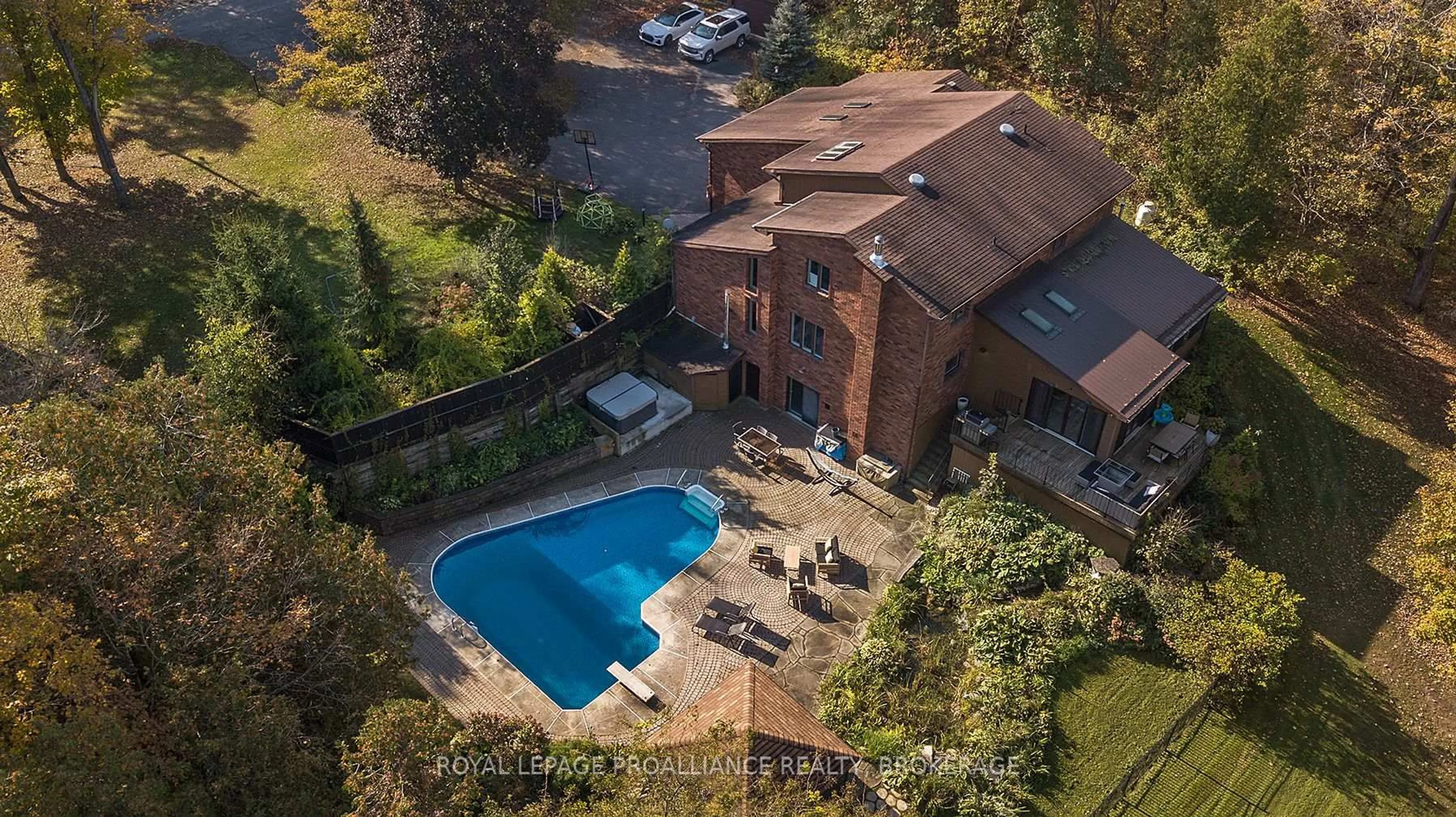 A pic from outside/outdoor area/front of a property/back of a property/a pic from drone, water/lake/river/ocean view for 1059 Cedarwoods Dr, Verona Ontario K0H 2W0