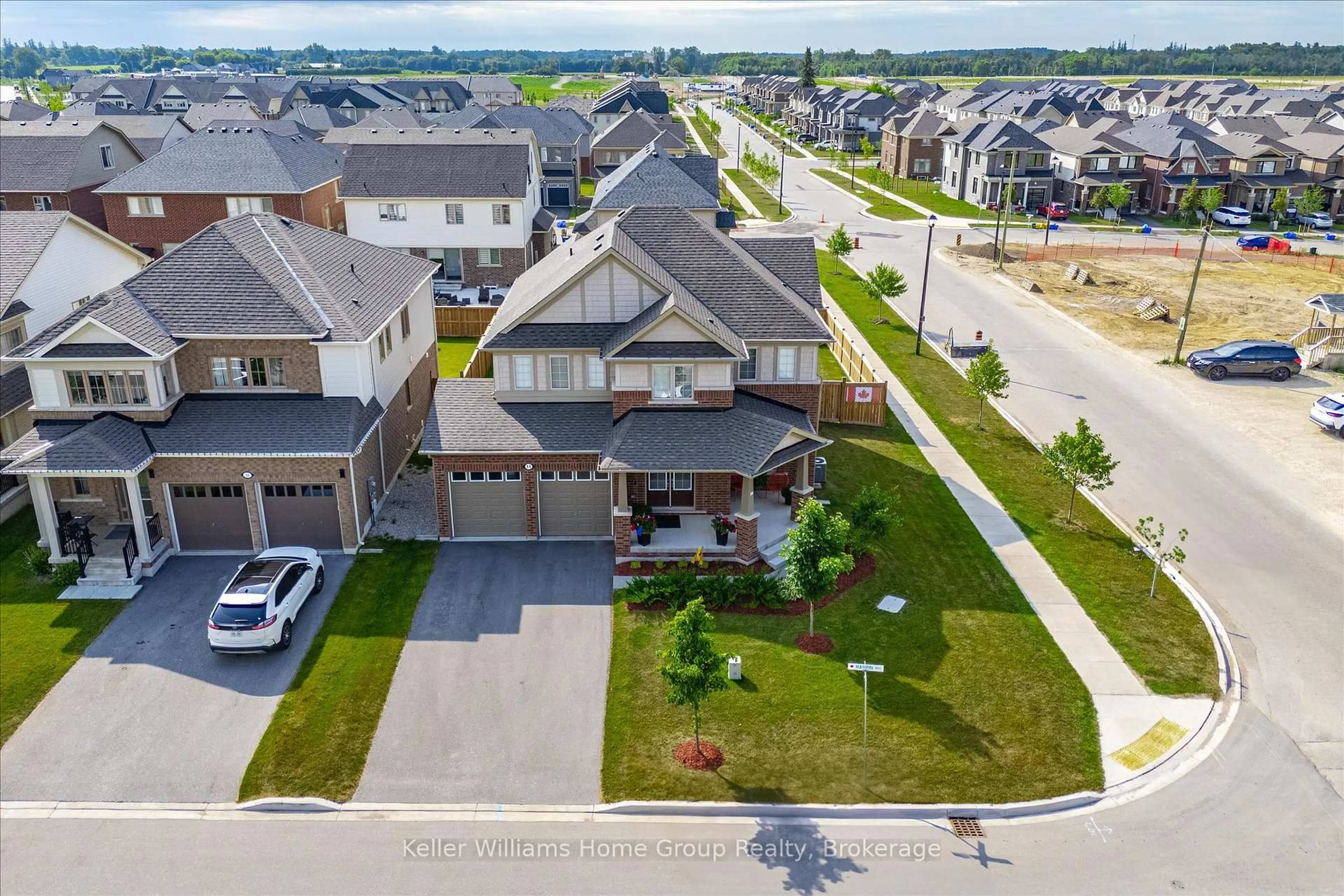 A pic from outside/outdoor area/front of a property/back of a property/a pic from drone, street for 11 Harpin Way, Centre Wellington Ontario N1M 0H2