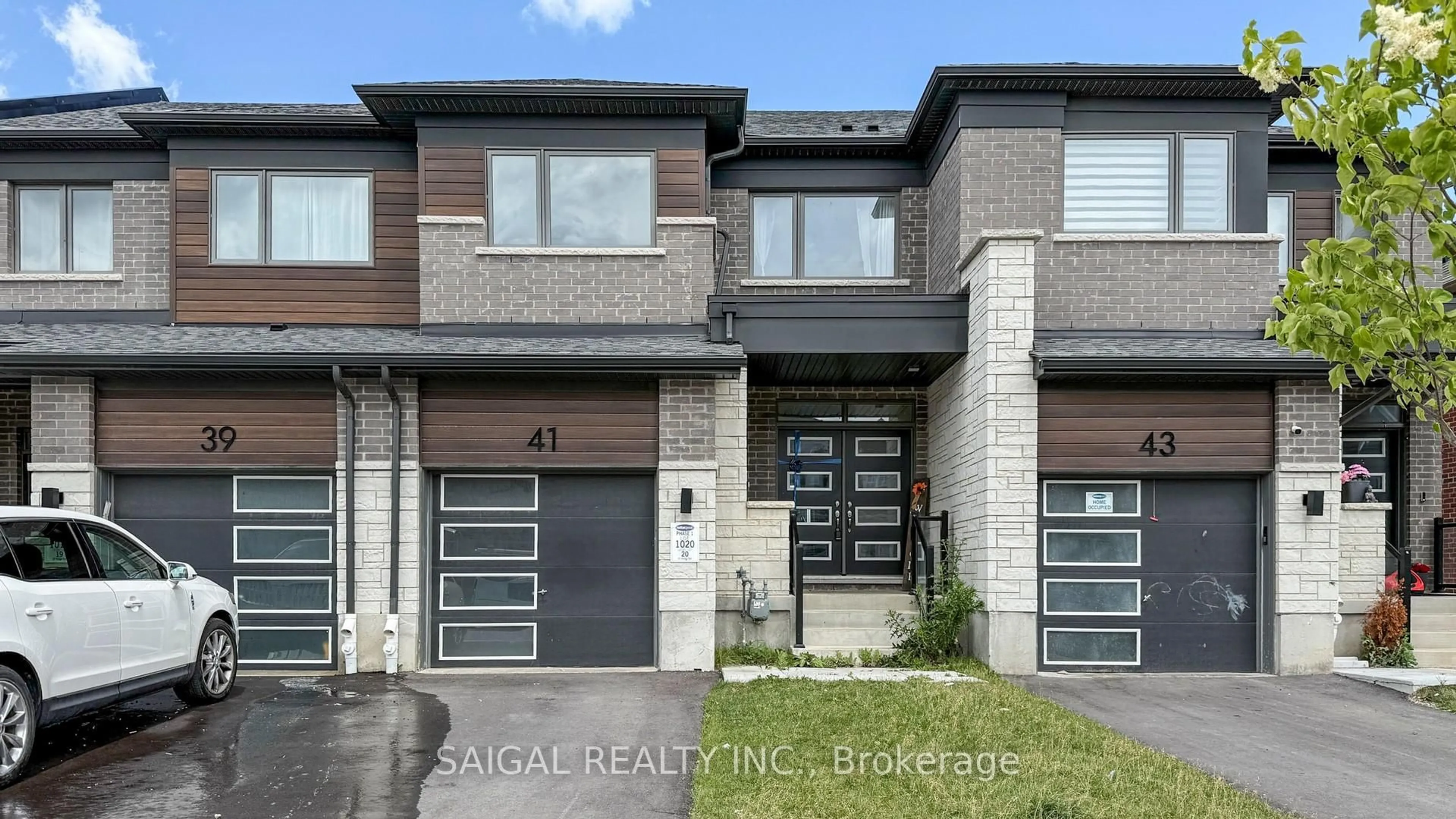 Home with brick exterior material, street for 41 Histand Tr, Kitchener Ontario N2R 0S2