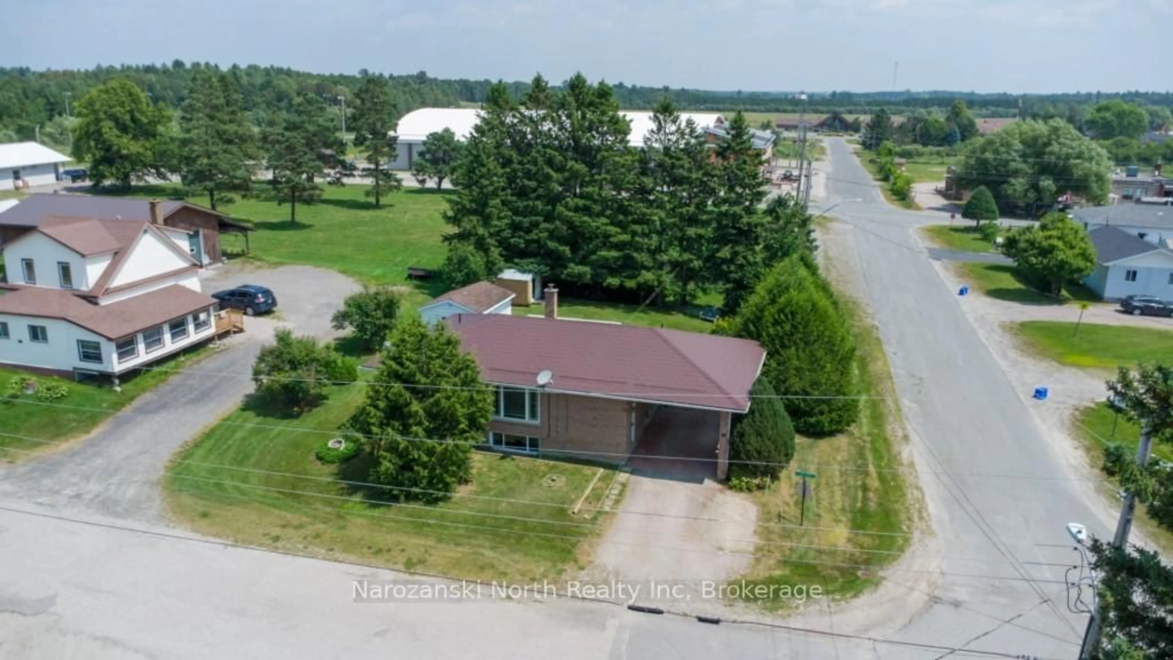 A pic from outside/outdoor area/front of a property/back of a property/a pic from drone, water/lake/river/ocean view for 20 Dollard St, French River Ontario P0M 2N0