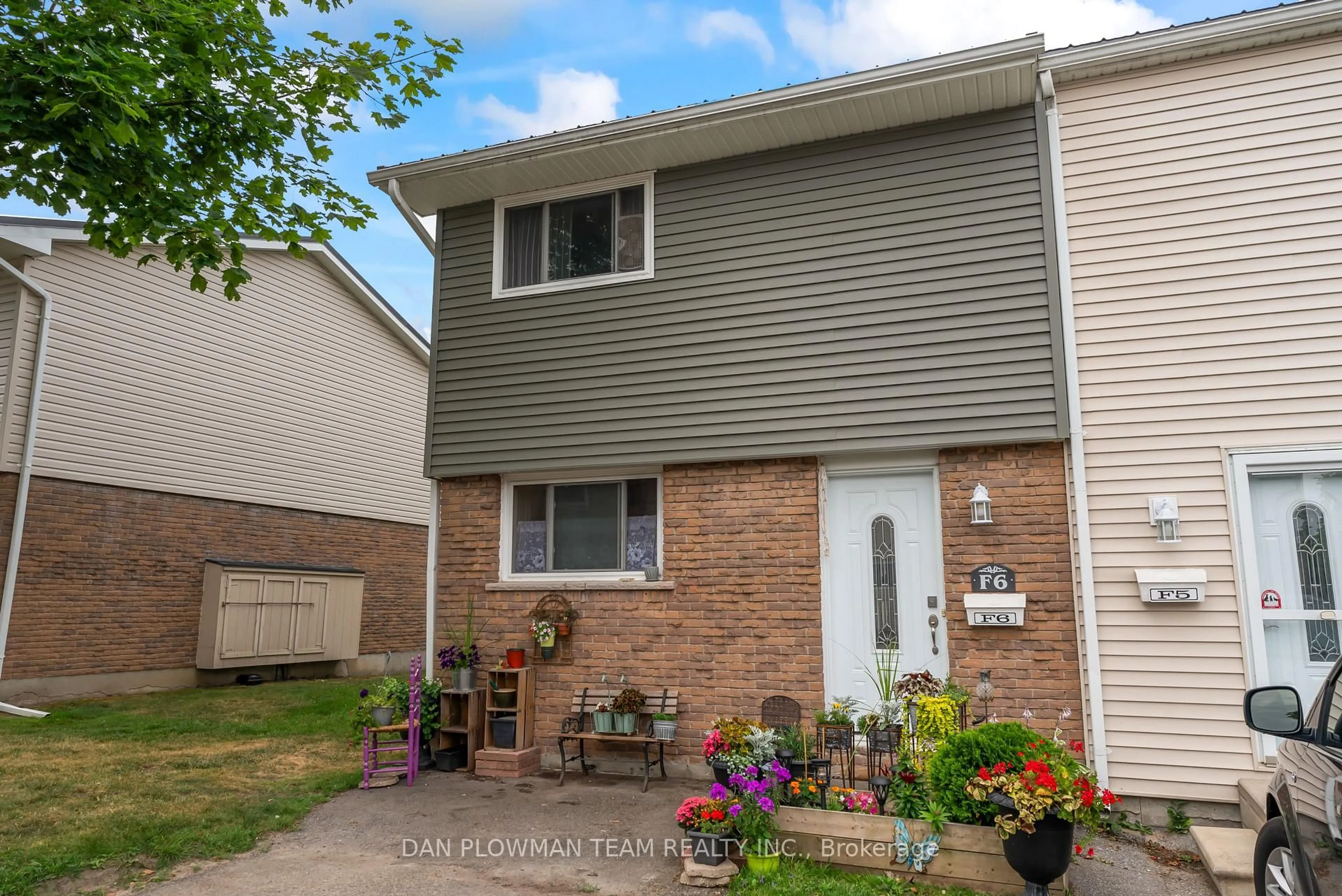 Home with vinyl exterior material, street for 400 Westwood Dr #F6, Cobourg Ontario K9A 2B6