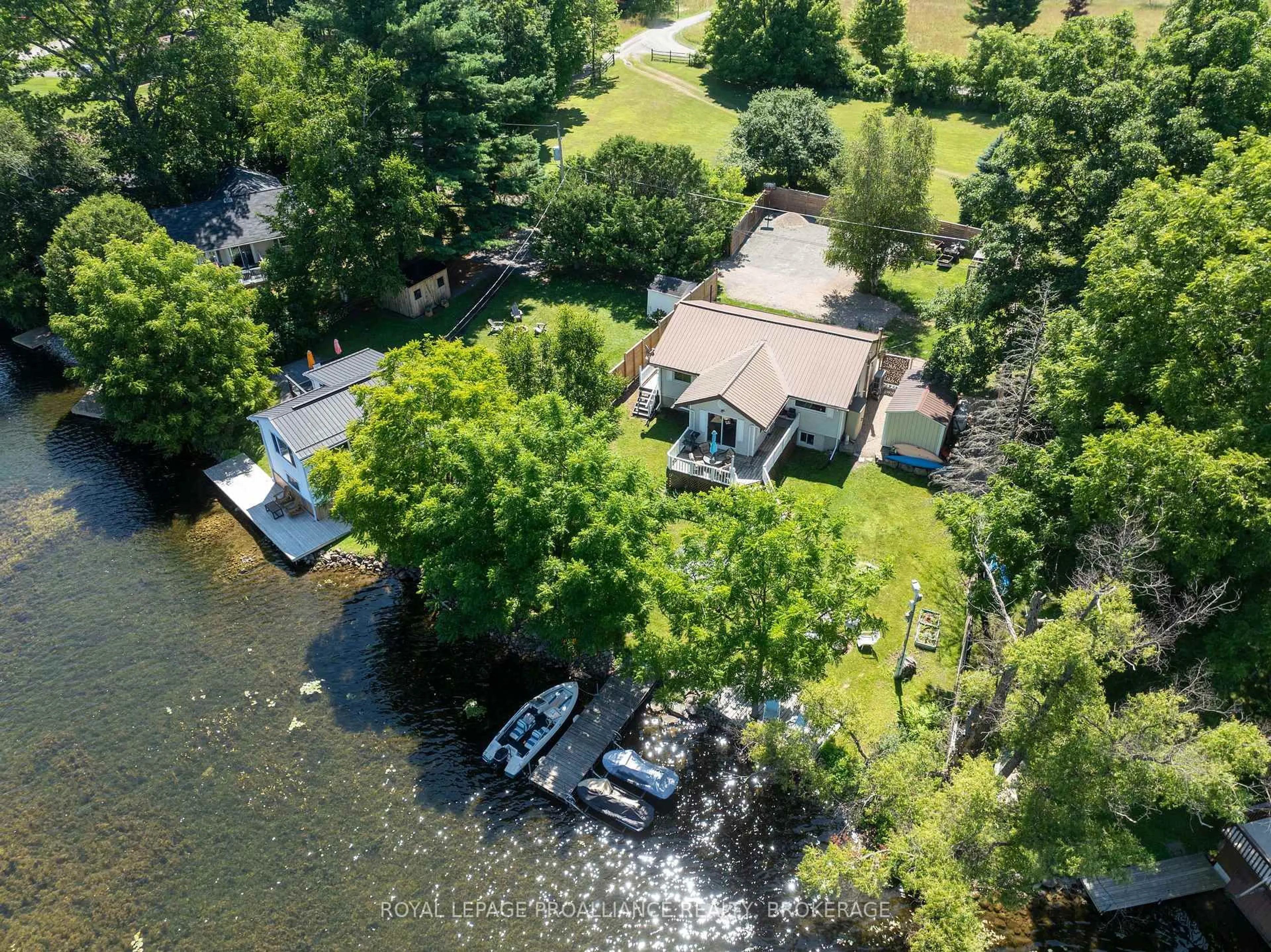 A pic from outside/outdoor area/front of a property/back of a property/a pic from drone, water/lake/river/ocean view for 42 Rebecca Lane, Westport Ontario K0G 1X0