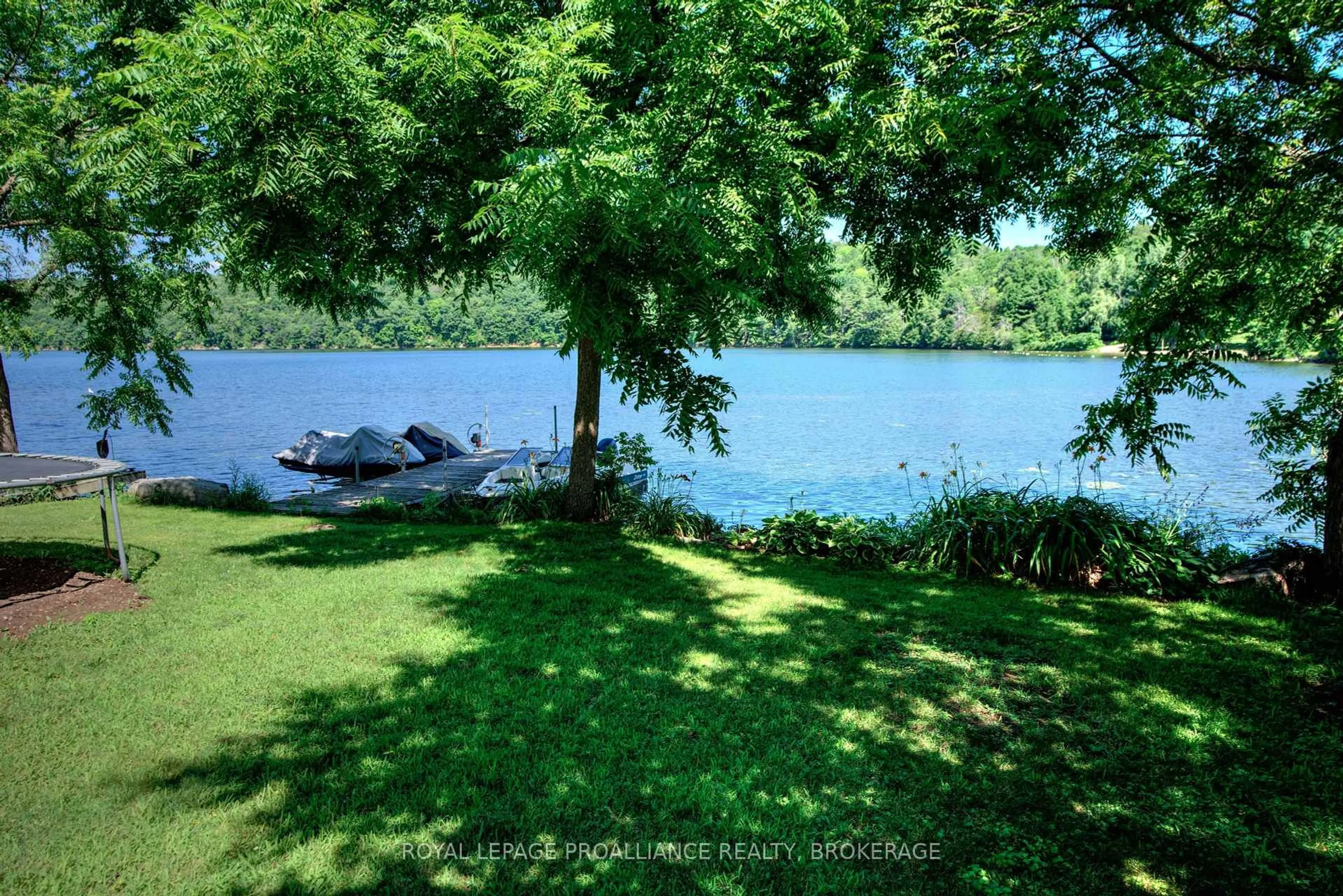 A pic from outside/outdoor area/front of a property/back of a property/a pic from drone, water/lake/river/ocean view for 42 Rebecca Lane, Westport Ontario K0G 1X0