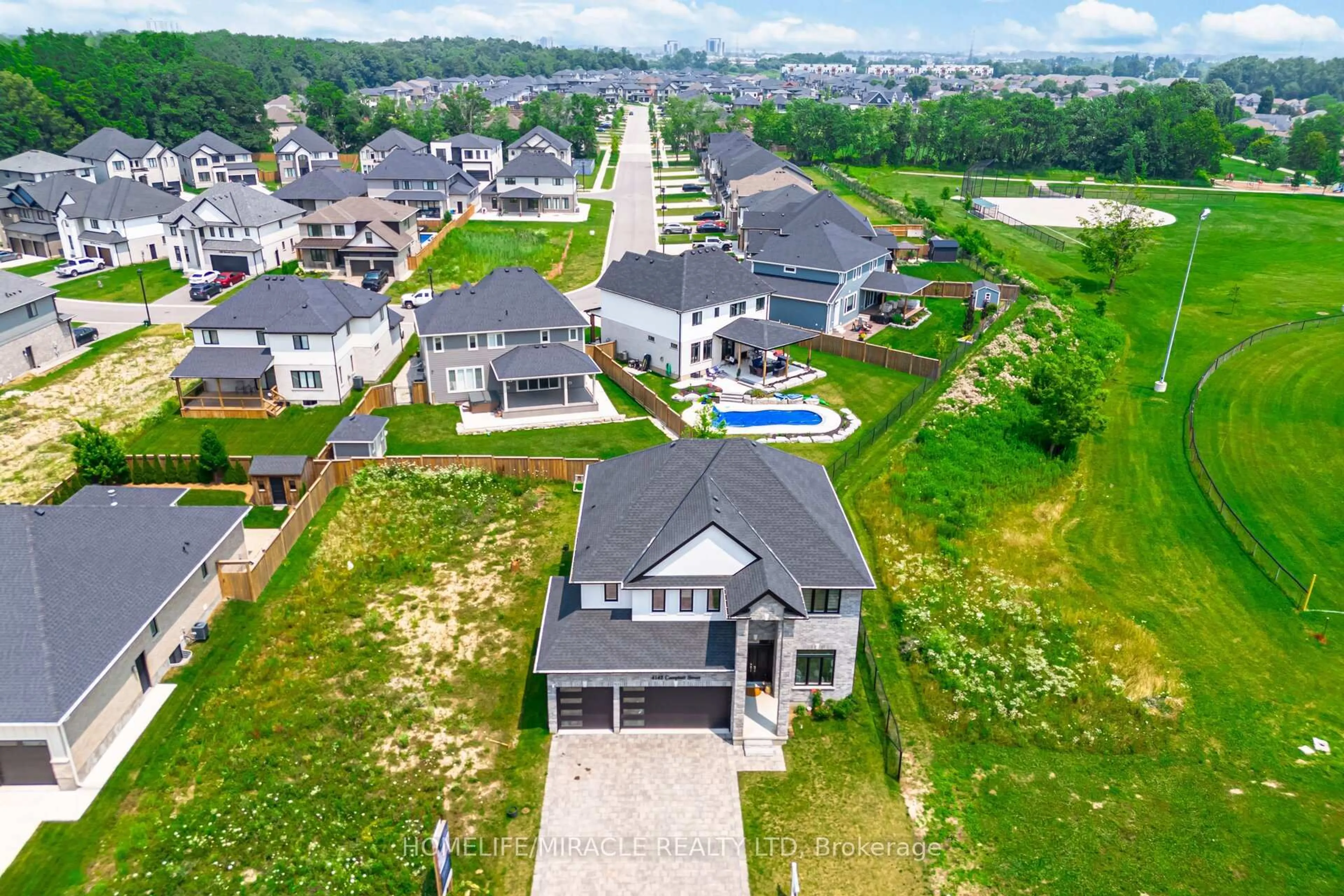 A pic from outside/outdoor area/front of a property/back of a property/a pic from drone, unknown for 4142 Campbell St, London South Ontario N6P 0H5