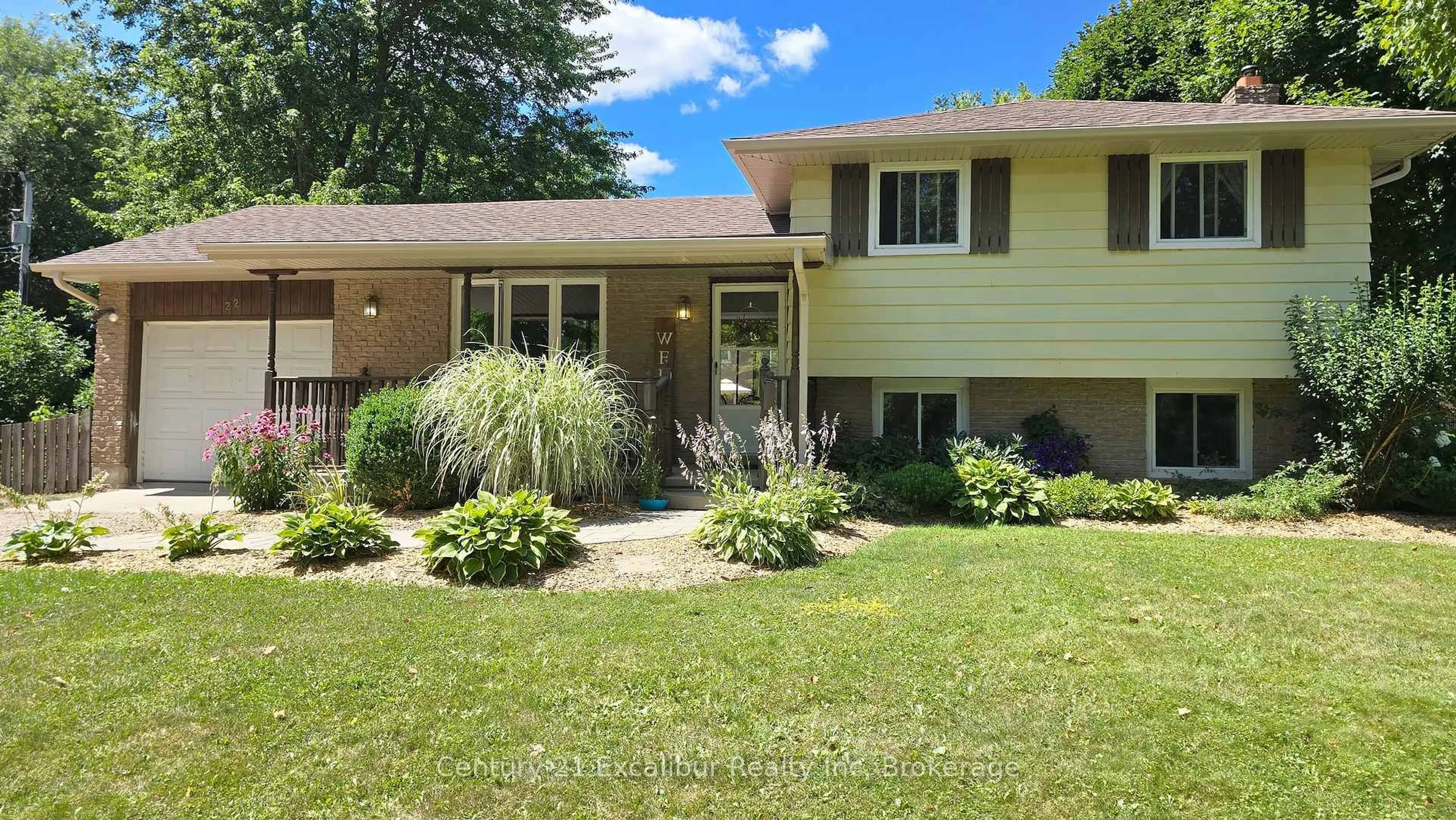 Home with vinyl exterior material, street for 22 Rebecca St, Mapleton Ontario N0B 1A0