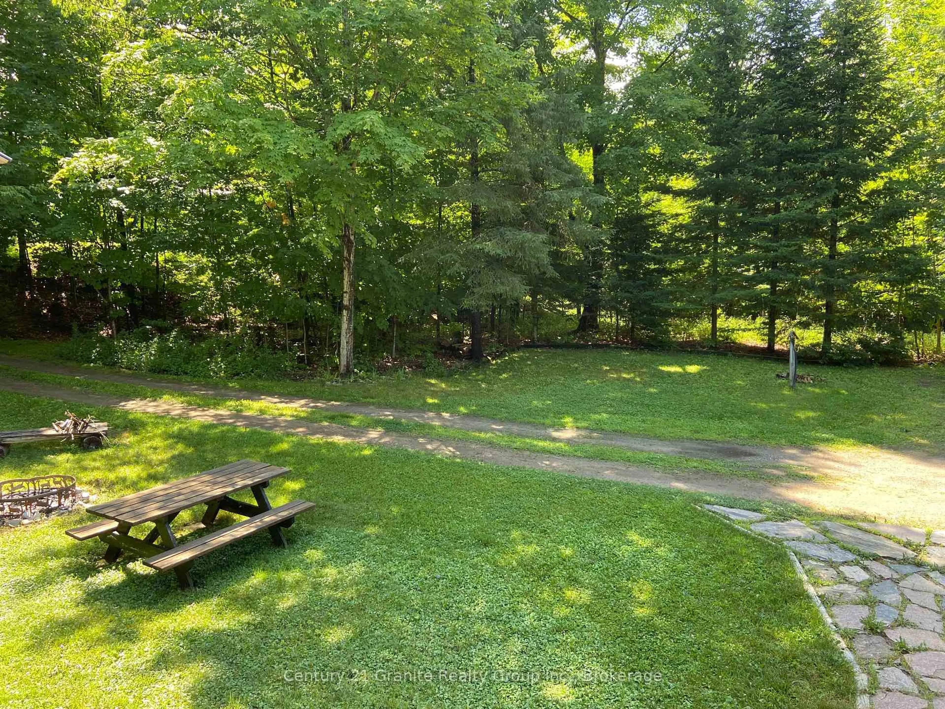 Patio, forest/trees view for 1931 Duck Lake Rd, Minden Hills Ontario K0M 1S0