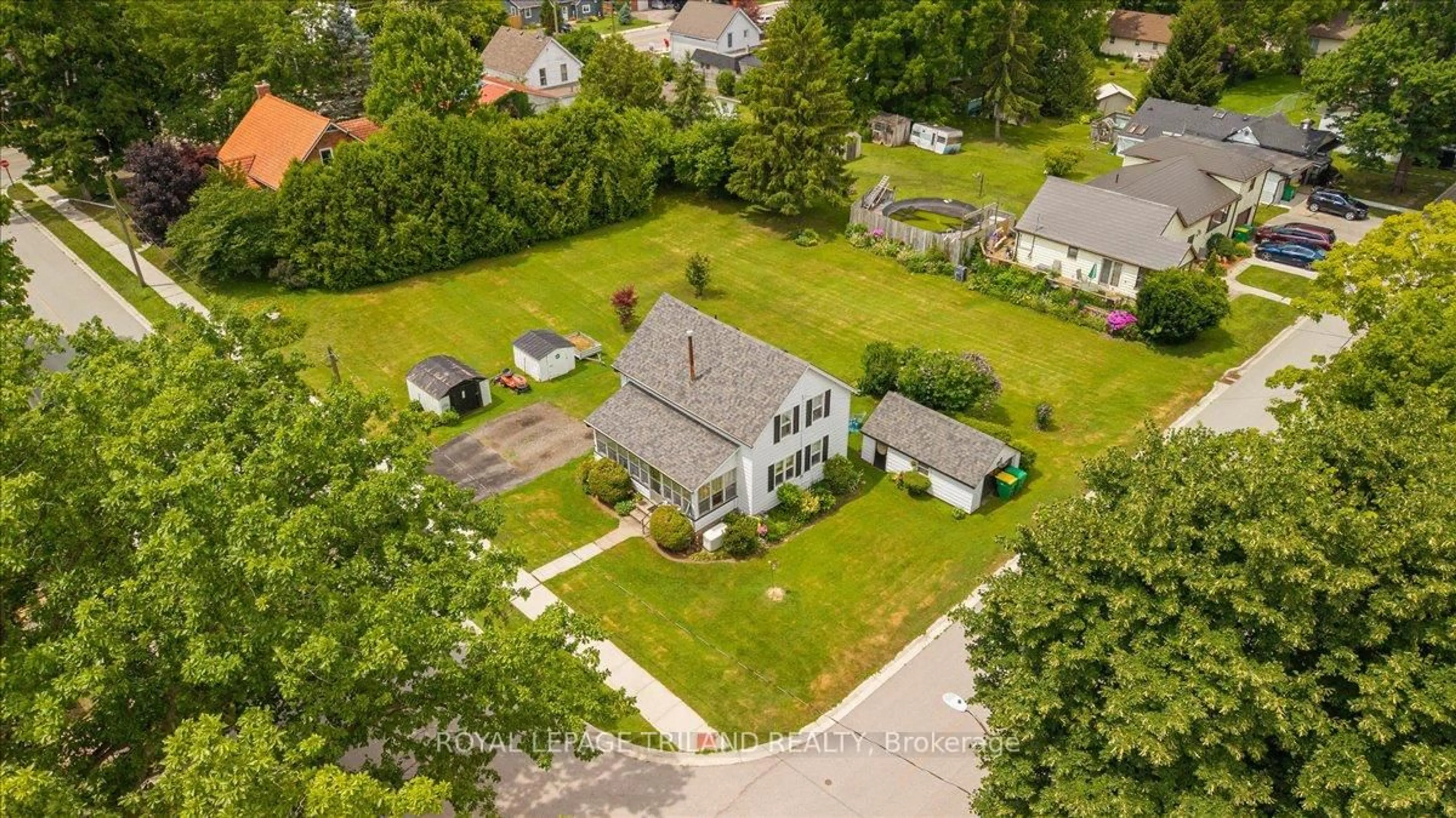 A pic from outside/outdoor area/front of a property/back of a property/a pic from drone, street for 21 Elgin St, Southwest Middlesex Ontario N0L 1A0