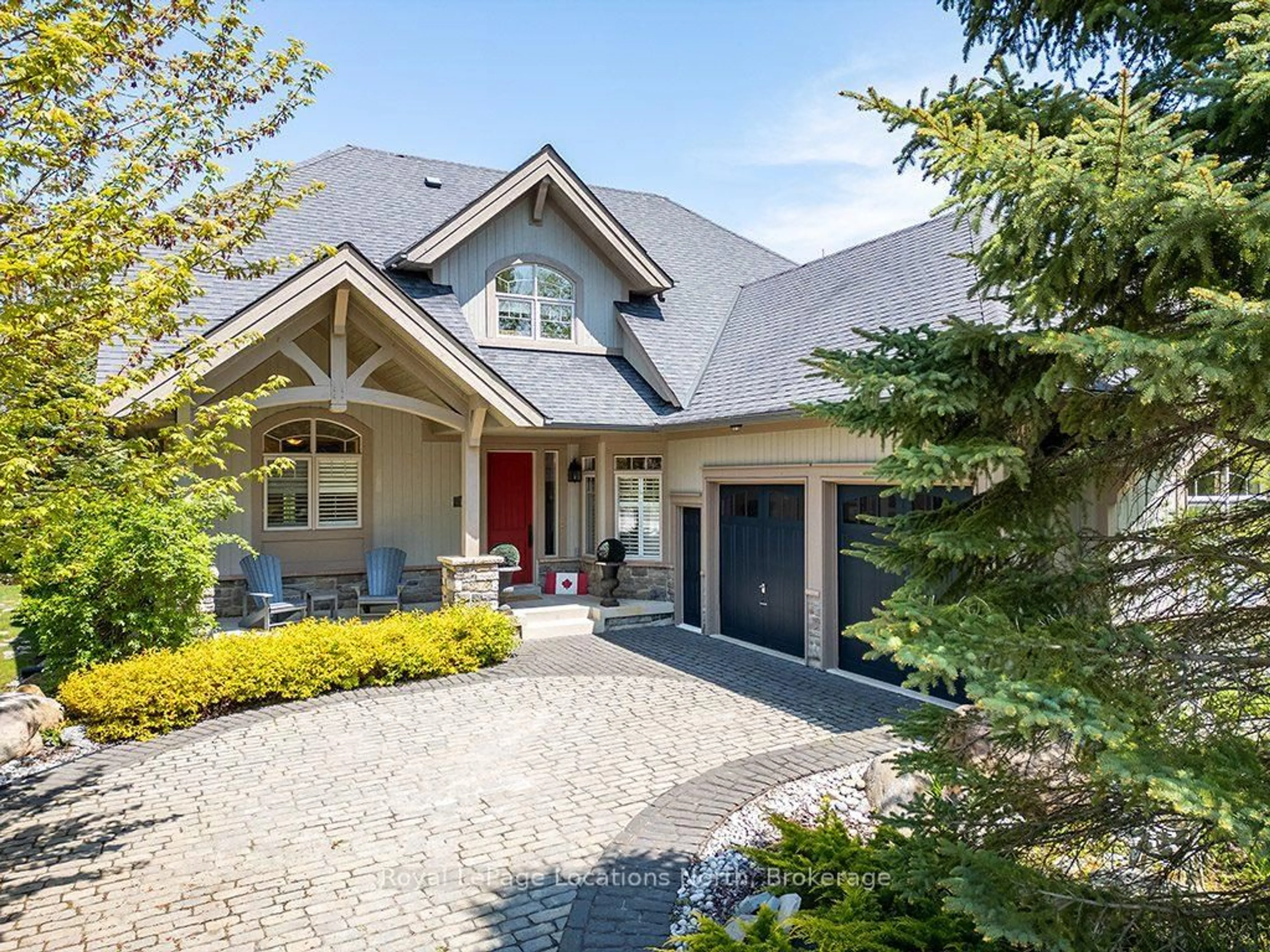 Home with brick exterior material, street for 135 EAST RIDGE Dr, Blue Mountains Ontario N0H 2P0