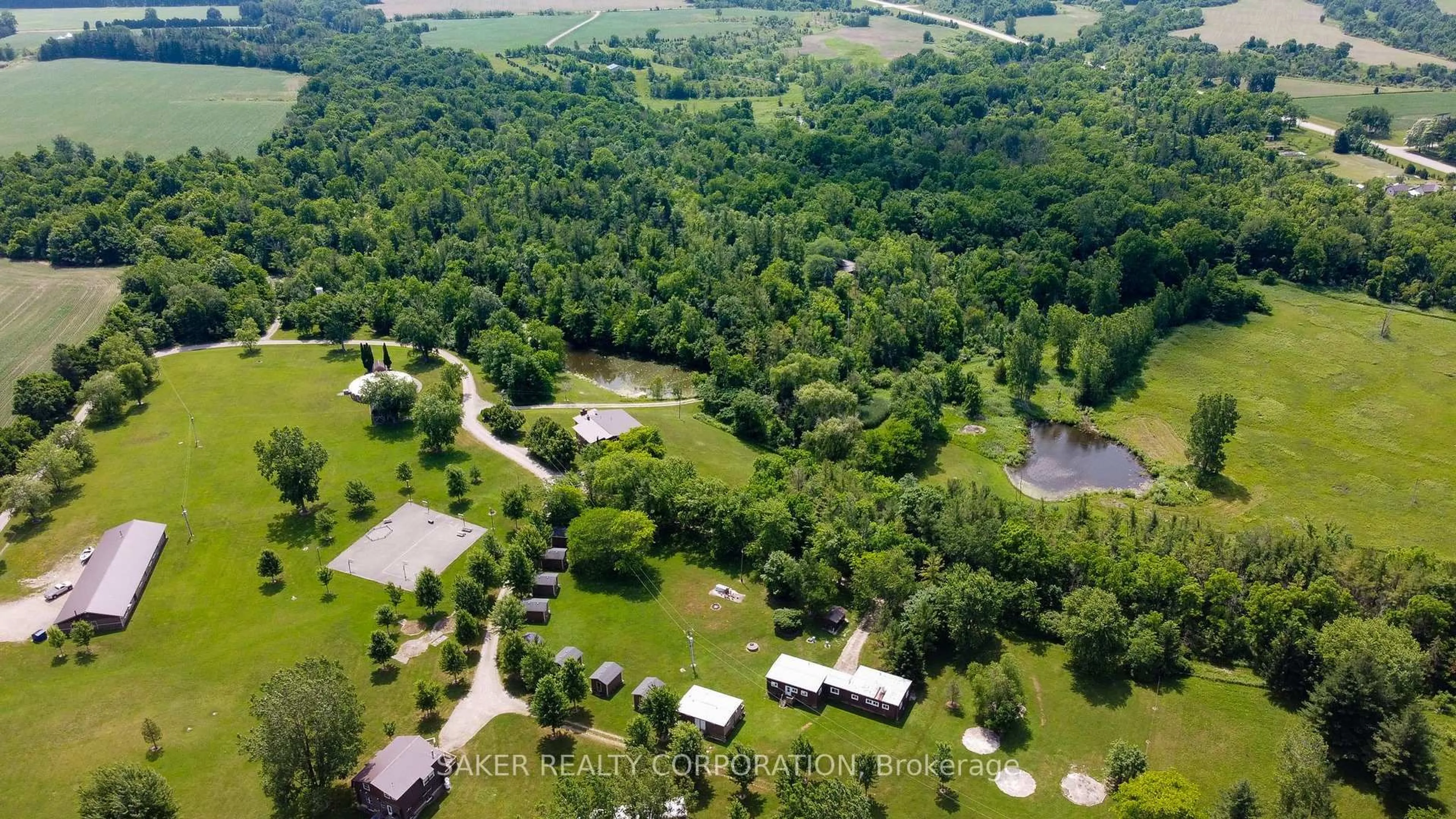 A pic from outside/outdoor area/front of a property/back of a property/a pic from drone, forest/trees view for 22663 Johnston Line, West Elgin Ontario N0L 0A2