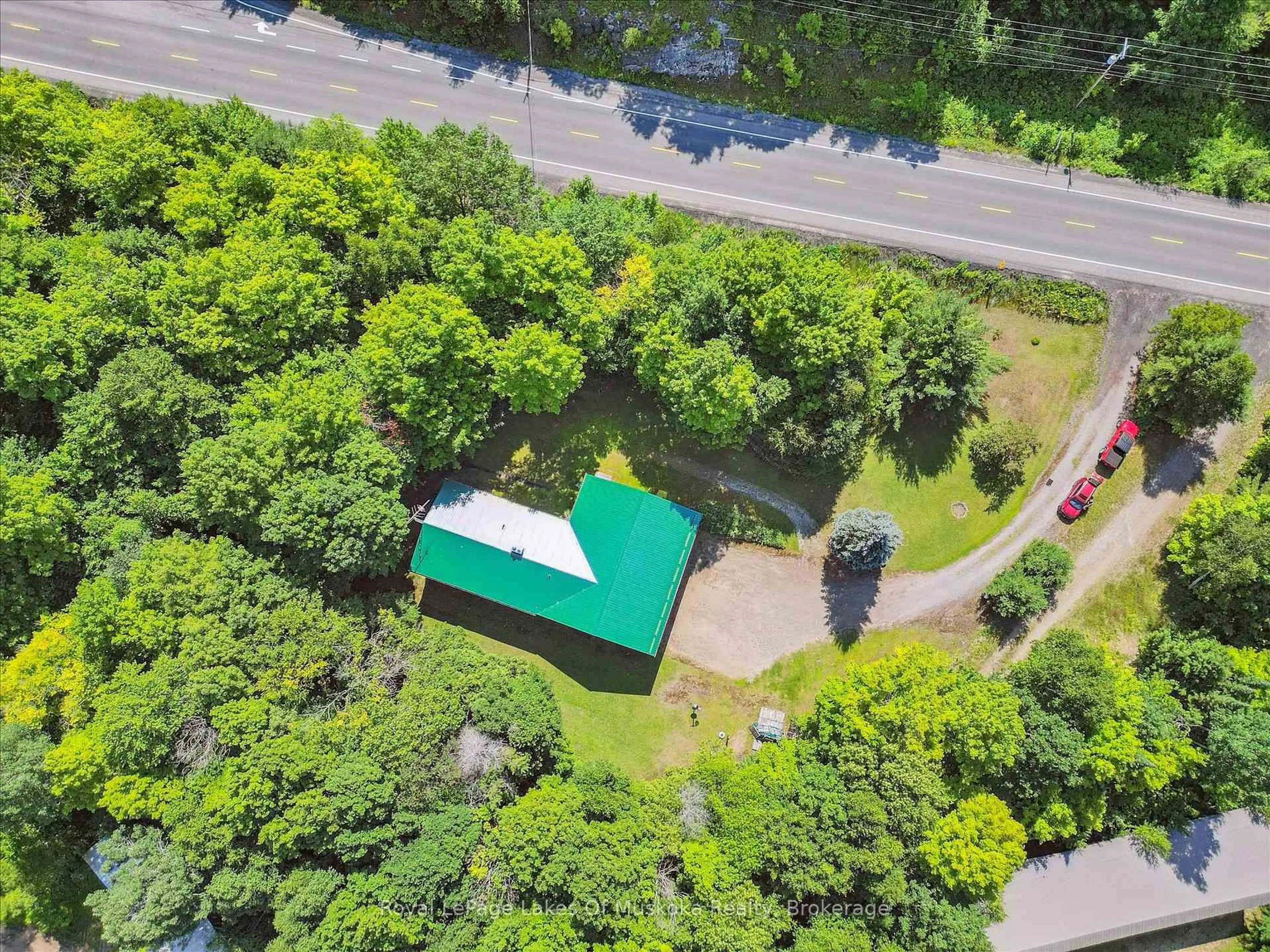 A pic from outside/outdoor area/front of a property/back of a property/a pic from drone, forest/trees view for 4159 Muskoka 117 Rd, Lake of Bays Ontario P0B 1A0