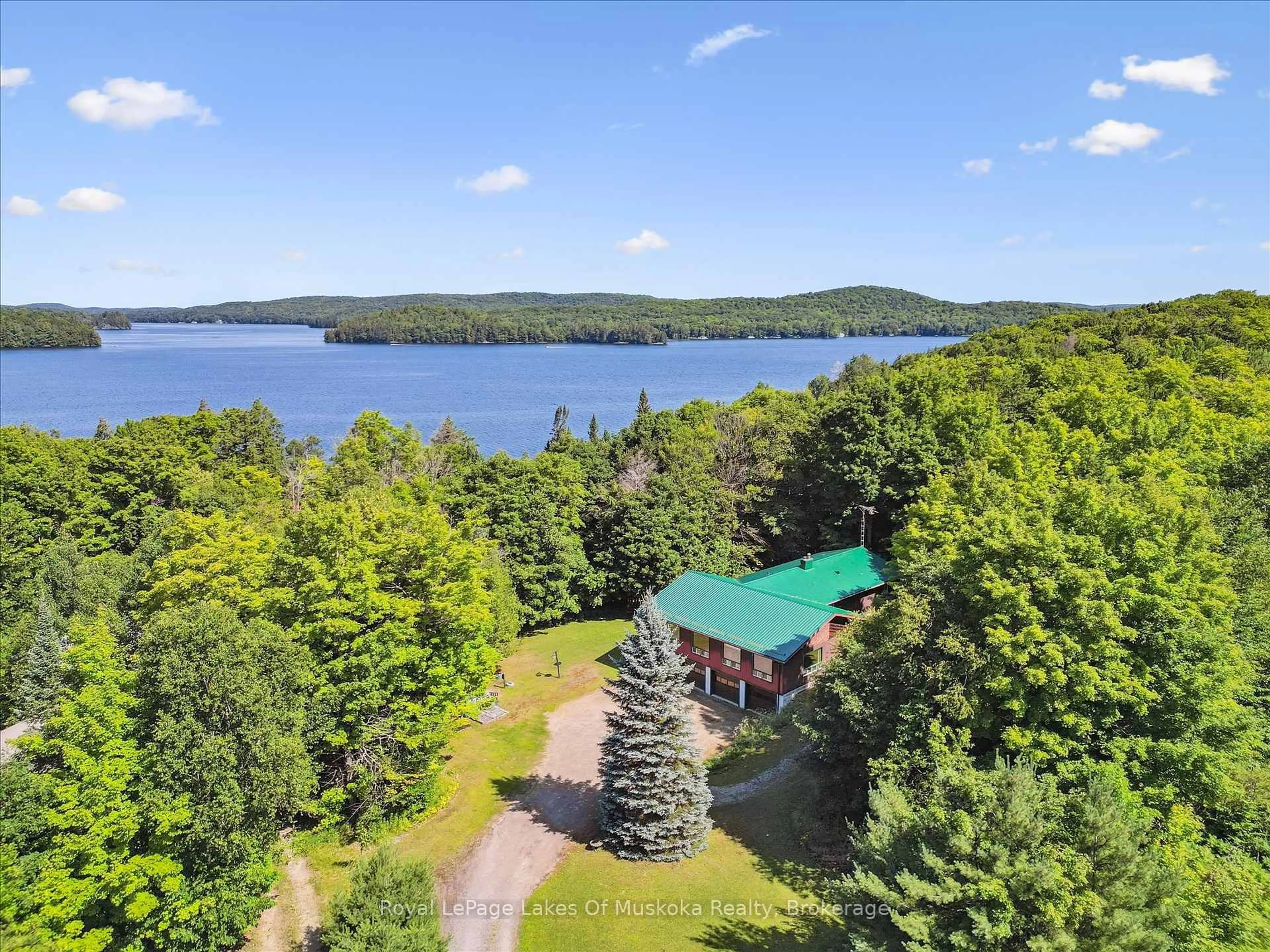 A pic from outside/outdoor area/front of a property/back of a property/a pic from drone, water/lake/river/ocean view for 4159 Muskoka 117 Rd, Lake of Bays Ontario P0B 1A0
