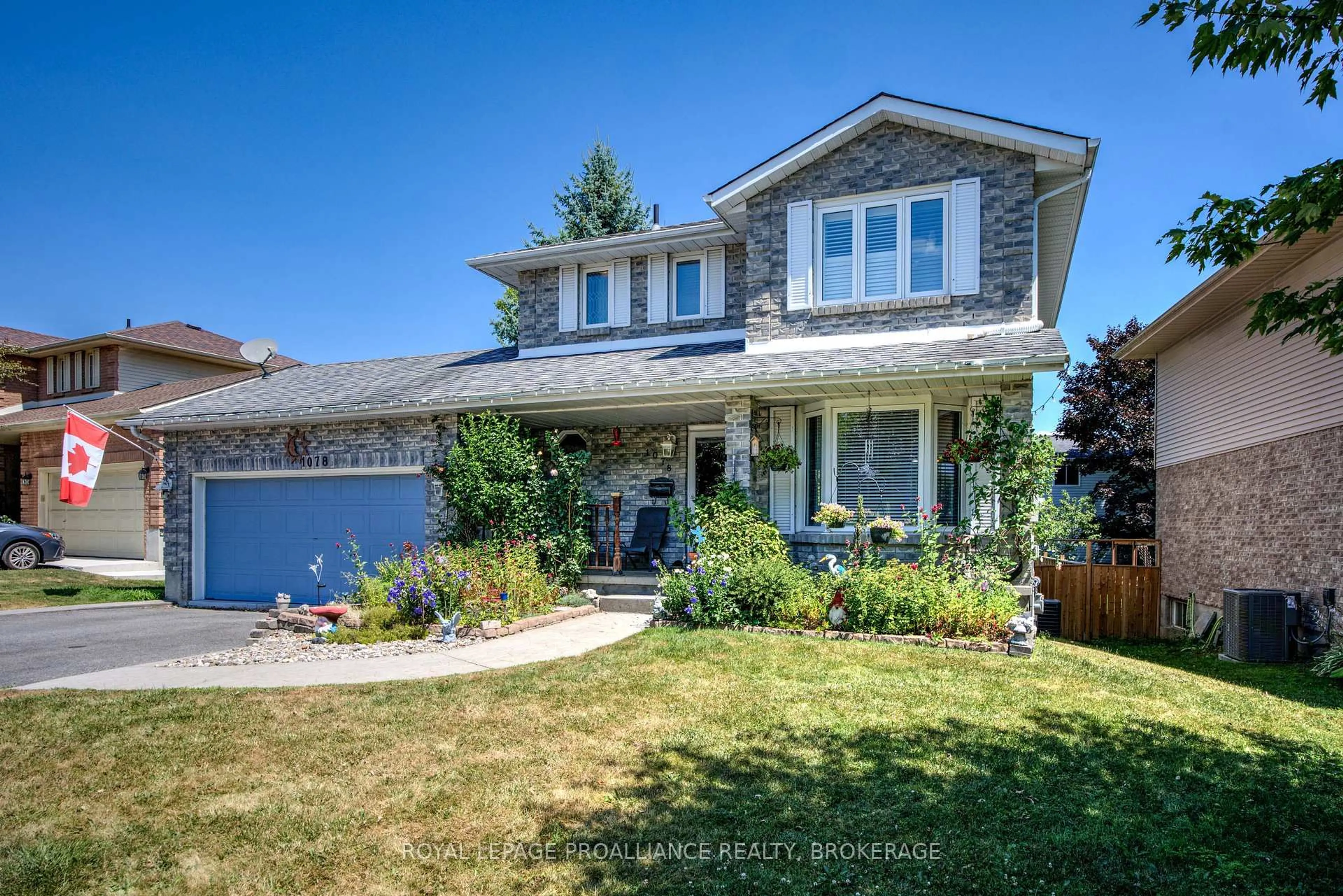 Home with vinyl exterior material, street for 1078 Lombardy St, Kingston Ontario K7M 8M6
