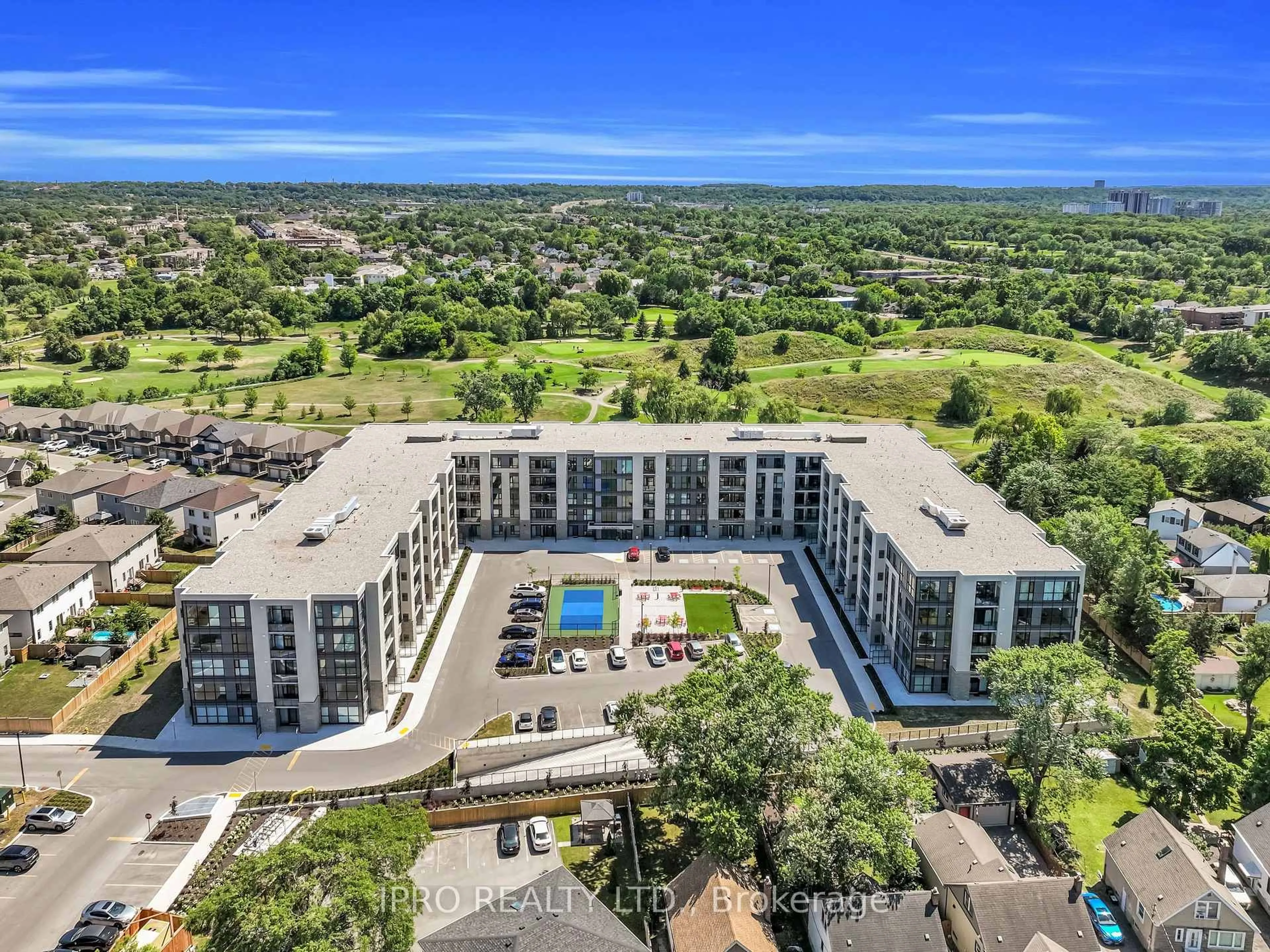 A pic from outside/outdoor area/front of a property/back of a property/a pic from drone, water/lake/river/ocean view for 50 Herrick Ave #130, St. Catharines Ontario L2P 0G3