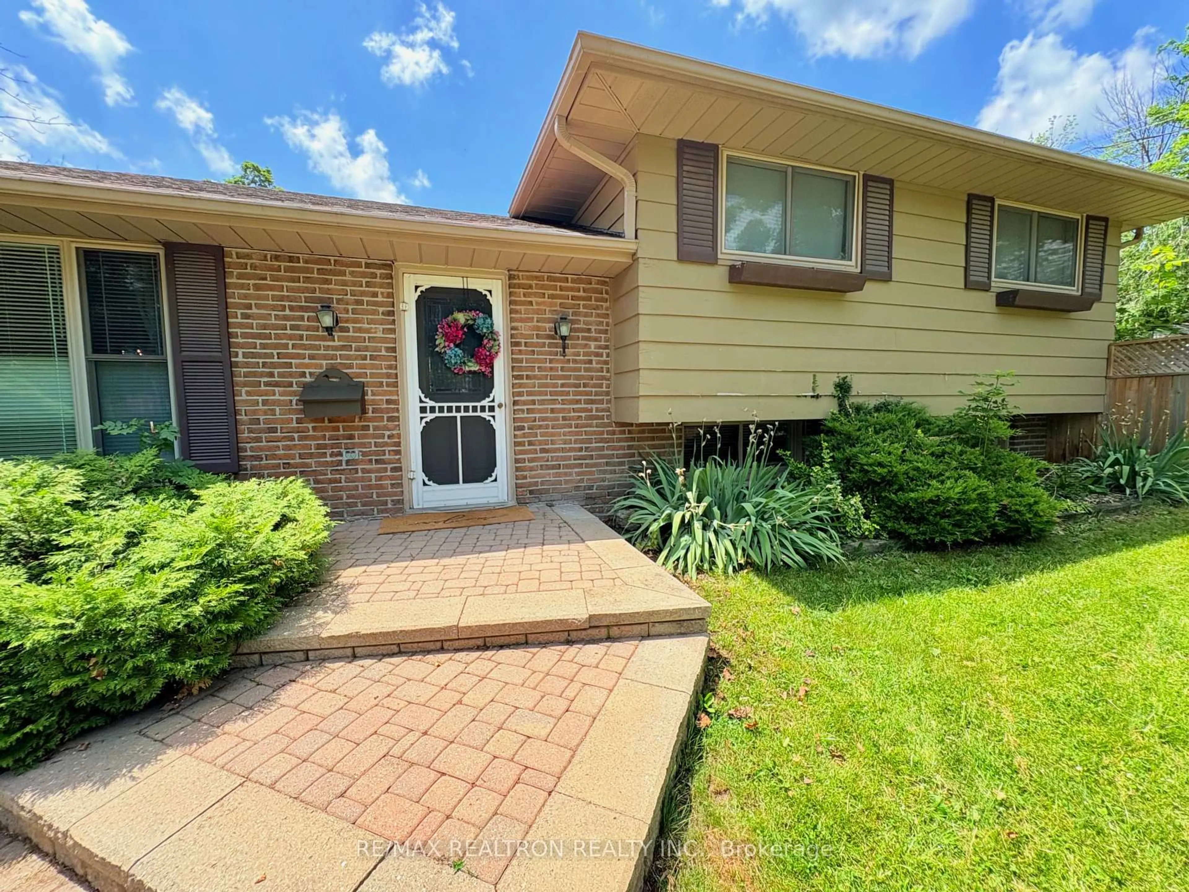 Home with brick exterior material, street for 323 Lindan Ave, Selwyn Ontario K9L 1K9