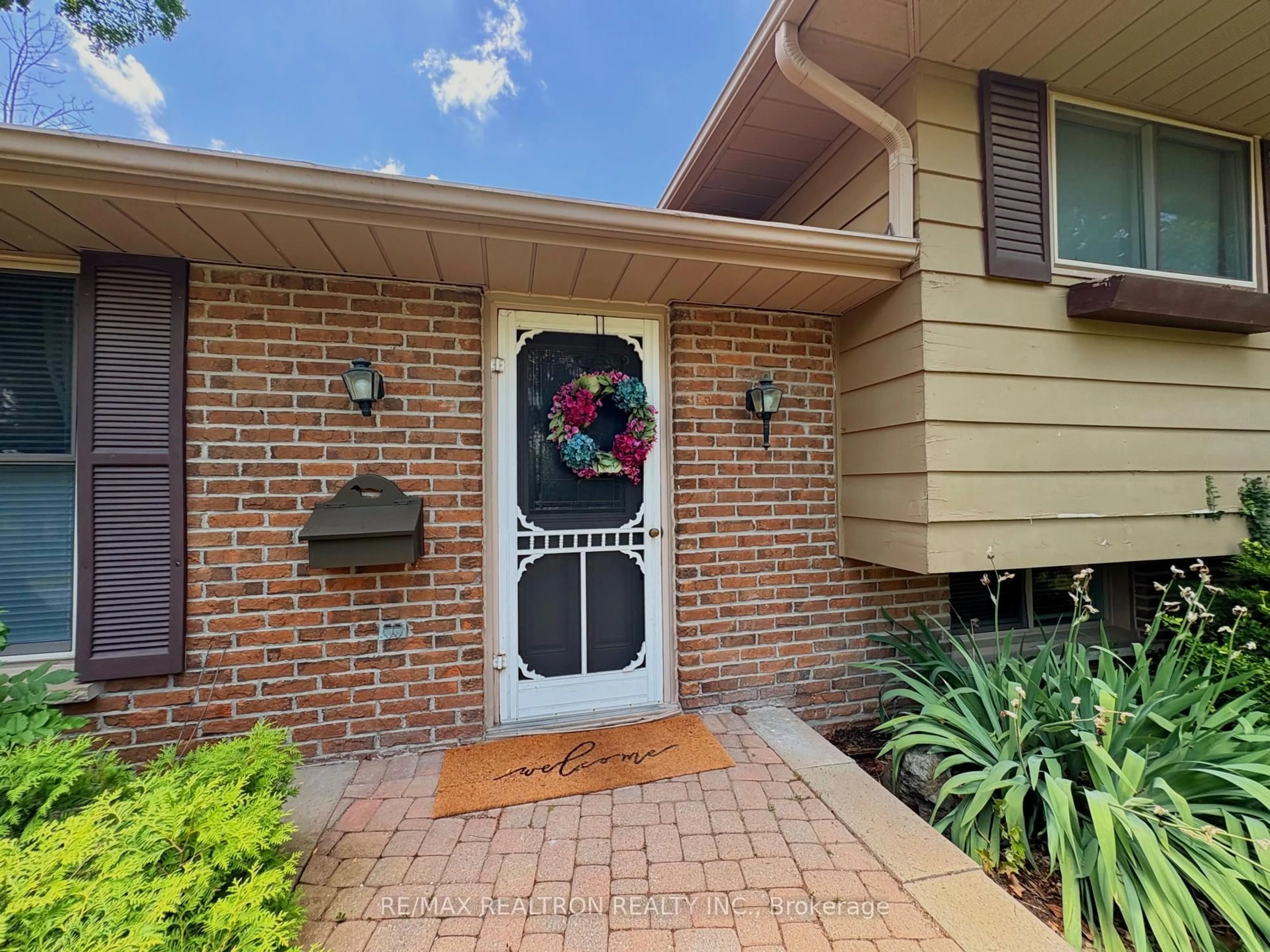 Home with brick exterior material, street for 323 Lindan Ave, Selwyn Ontario K9L 1K9