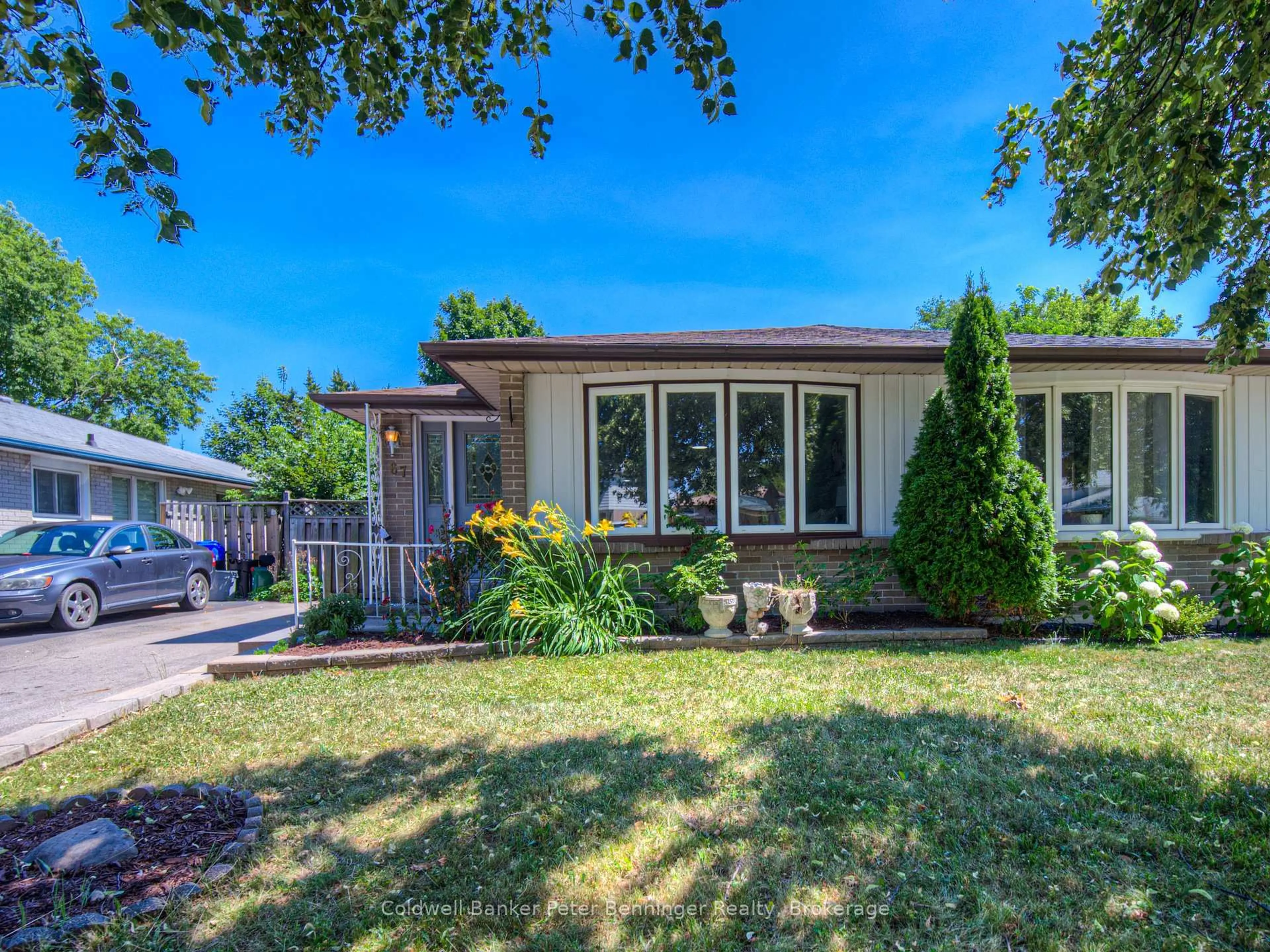 Home with vinyl exterior material, street for 67 Dalegrove Dr, Kitchener Ontario N2M 2G6