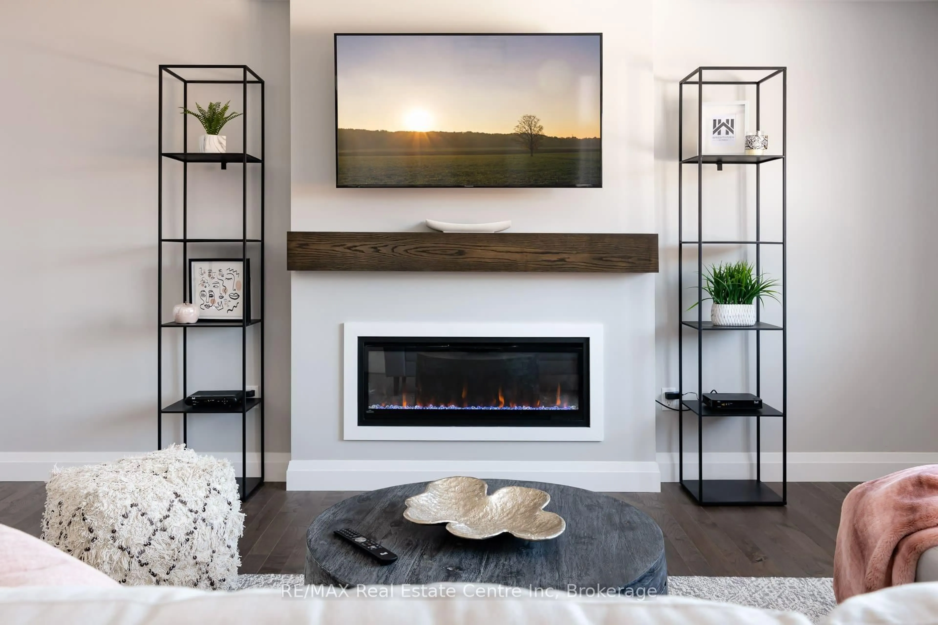 Living room with furniture, wood/laminate floor for 222 Bridge Cres, Minto Ontario N0G 2P0