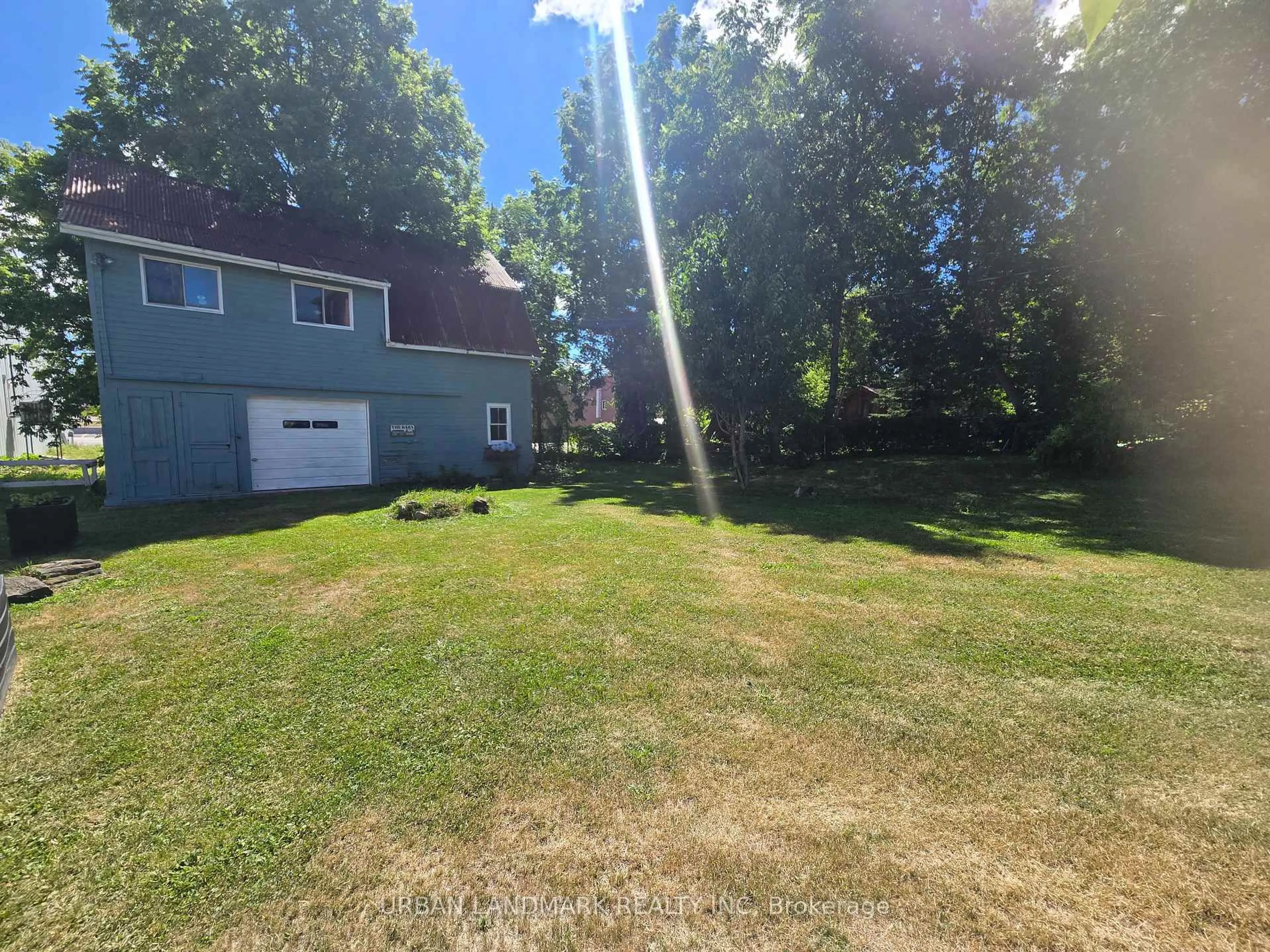 A pic from outside/outdoor area/front of a property/back of a property/a pic from drone, unknown for 117 Durham St, Madoc Ontario K0K 2K0