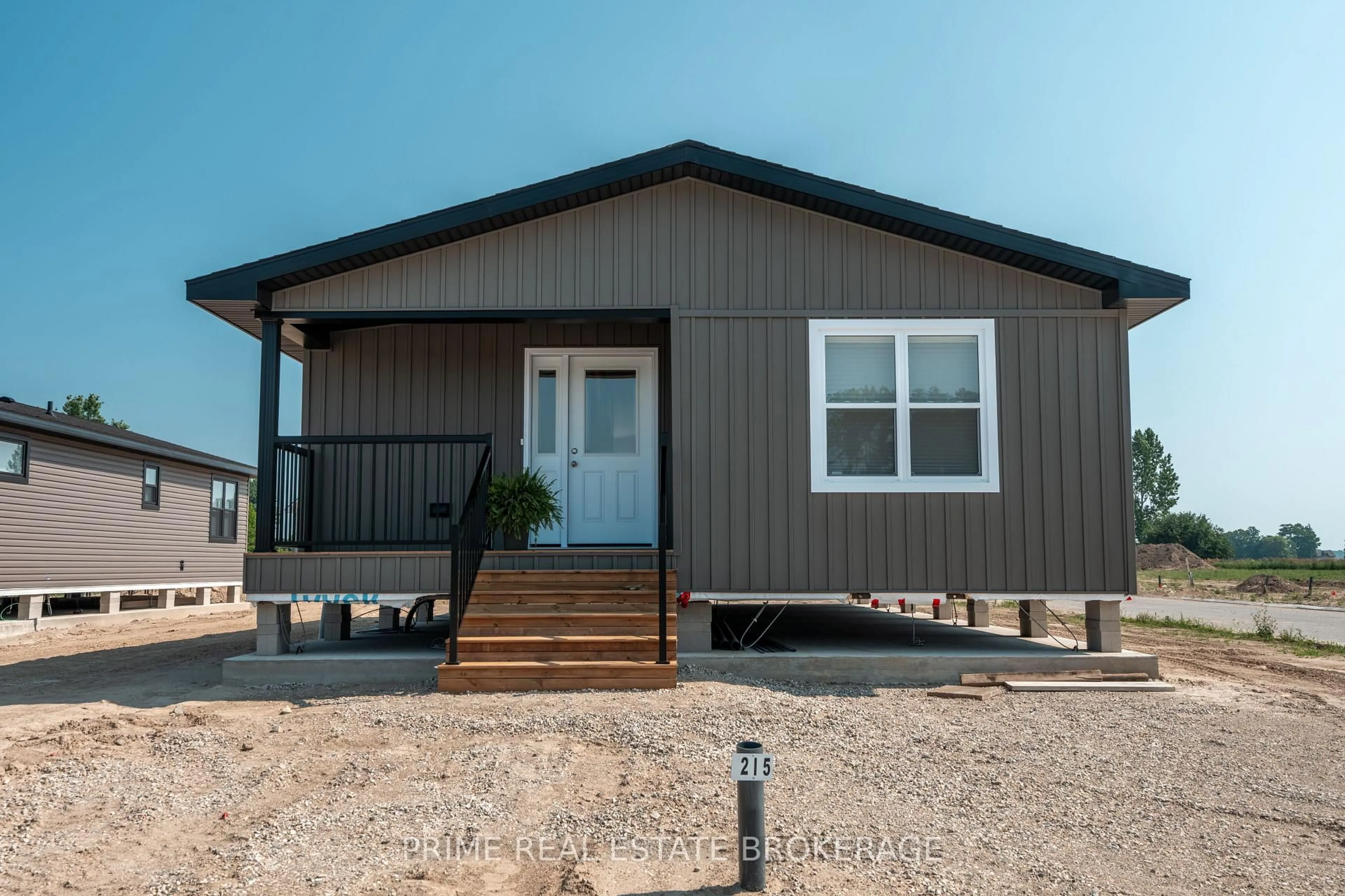 Home with vinyl exterior material, street for 213 Carolynn Way #Lot 8, North Perth Ontario N4W 3G8