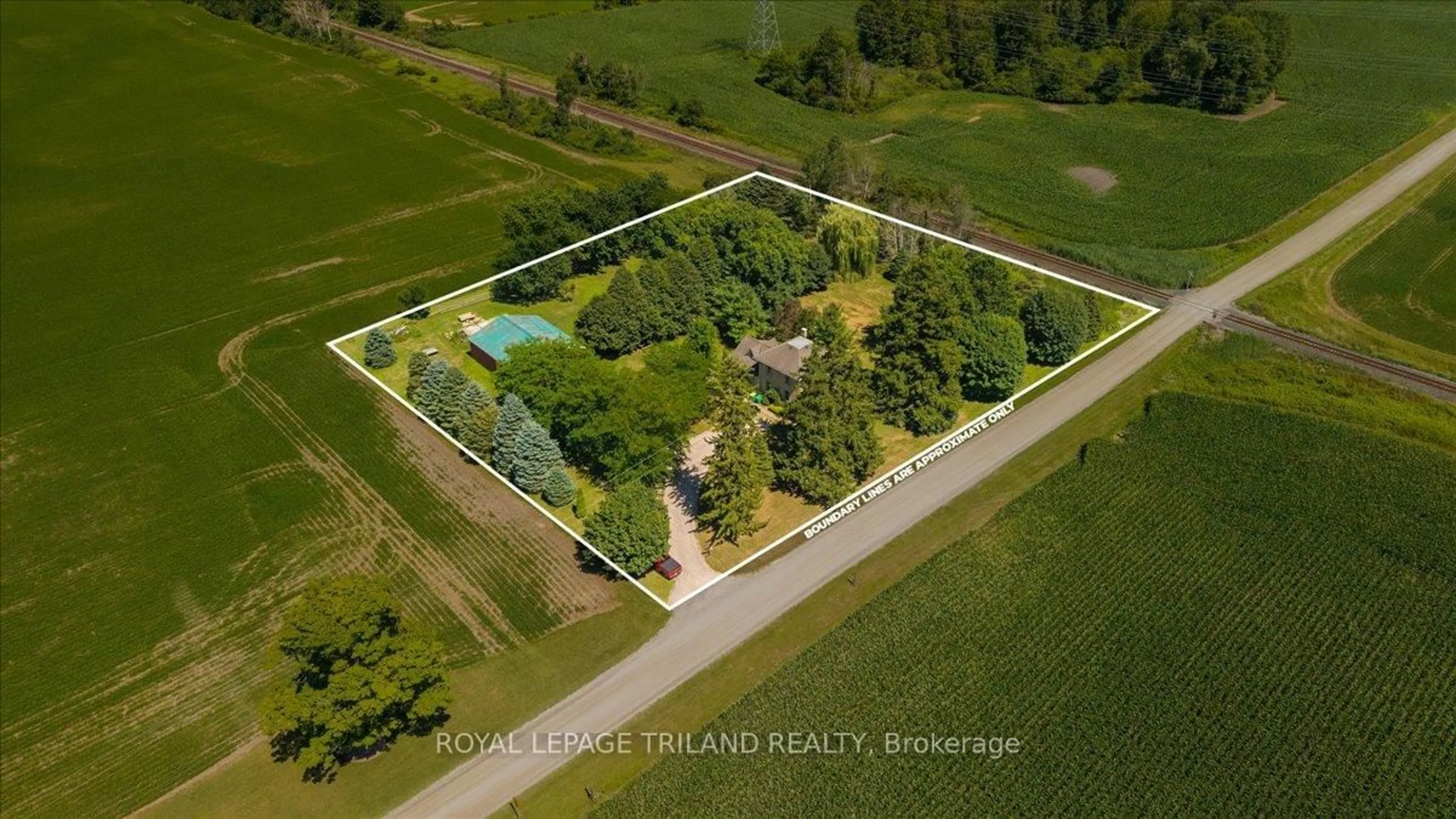 A pic from outside/outdoor area/front of a property/back of a property/a pic from drone, building for 23186 Springfield Rd, Southwest Middlesex Ontario N0L 1A0