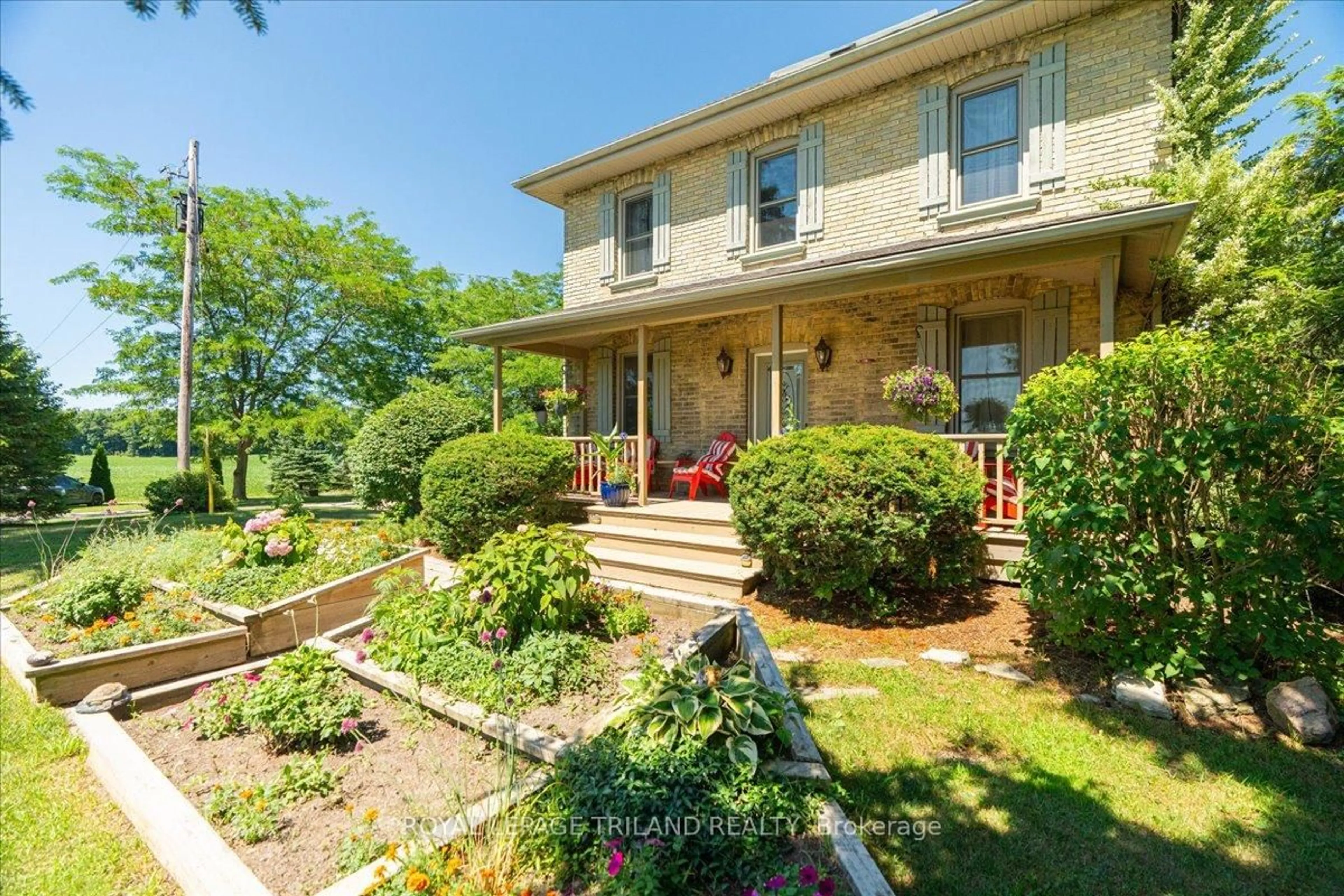 A pic from outside/outdoor area/front of a property/back of a property/a pic from drone, unknown for 23186 Springfield Rd, Southwest Middlesex Ontario N0L 1A0