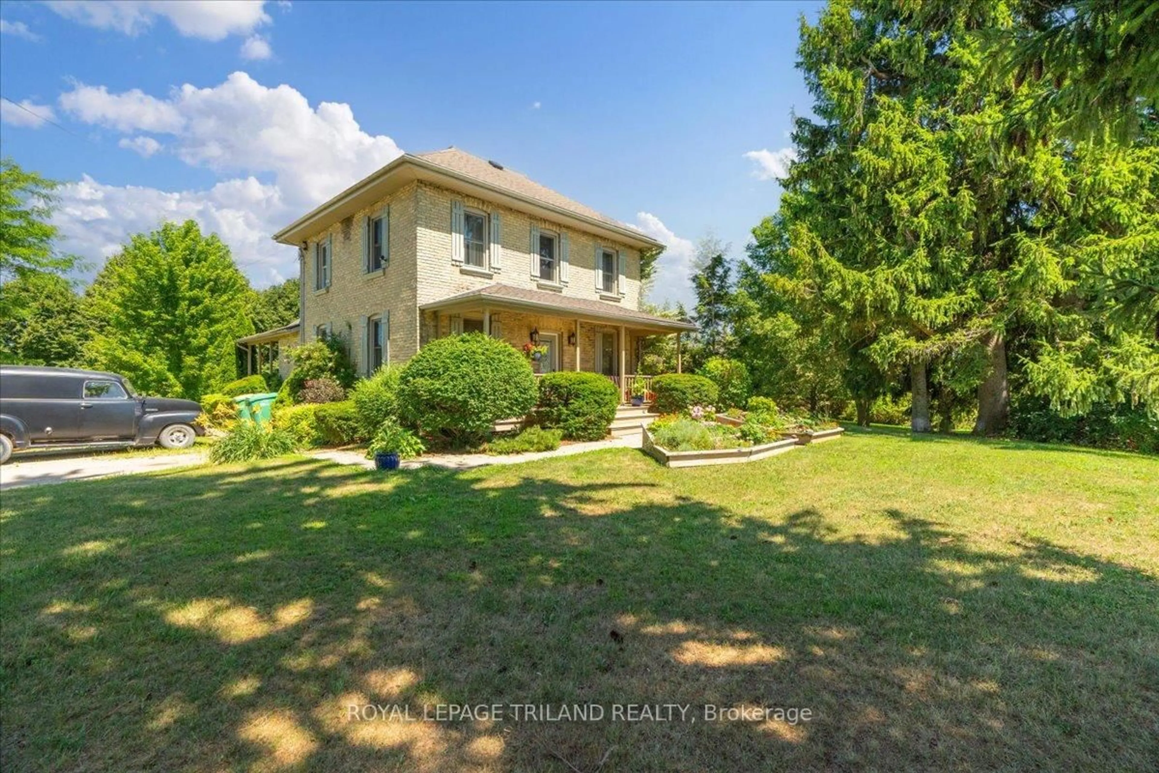 A pic from outside/outdoor area/front of a property/back of a property/a pic from drone, unknown for 23186 Springfield Rd, Southwest Middlesex Ontario N0L 1A0