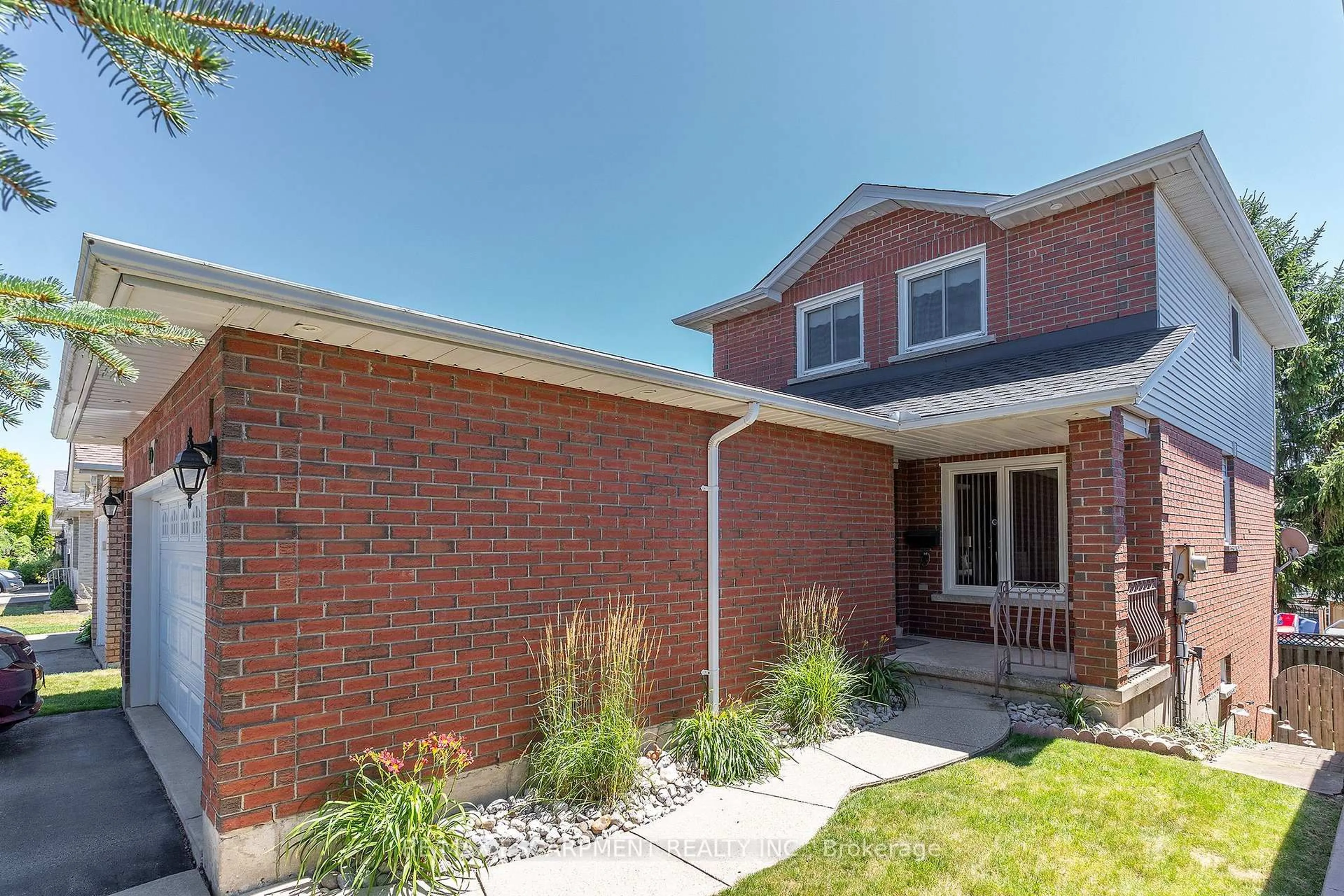 Home with brick exterior material, street for 50 Ossington Dr, Hamilton Ontario L8W 3S4