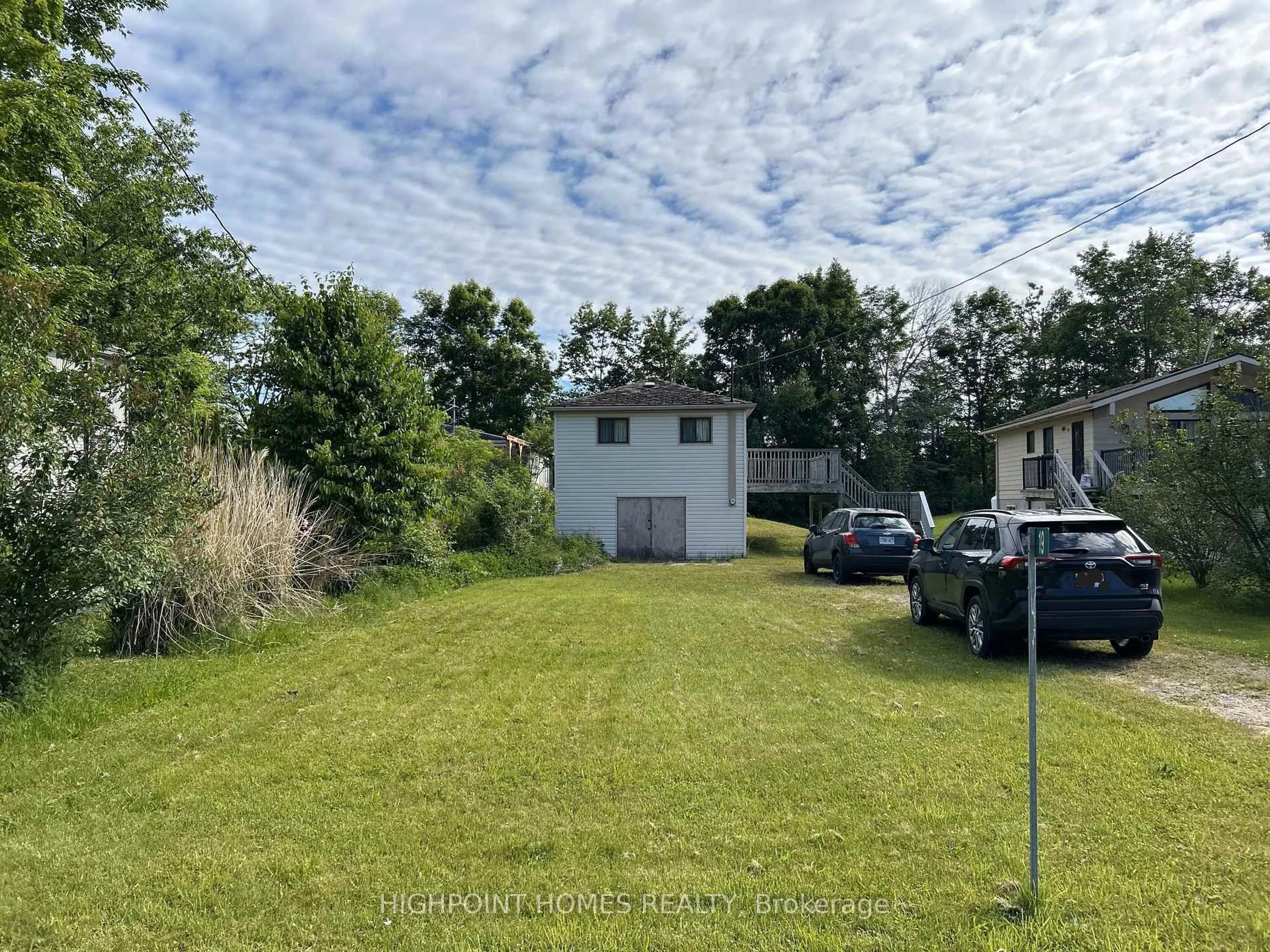A pic from outside/outdoor area/front of a property/back of a property/a pic from drone, water/lake/river/ocean view for 19 Lakeview Cottage Rd, Kawartha Lakes Ontario K0M 2B0