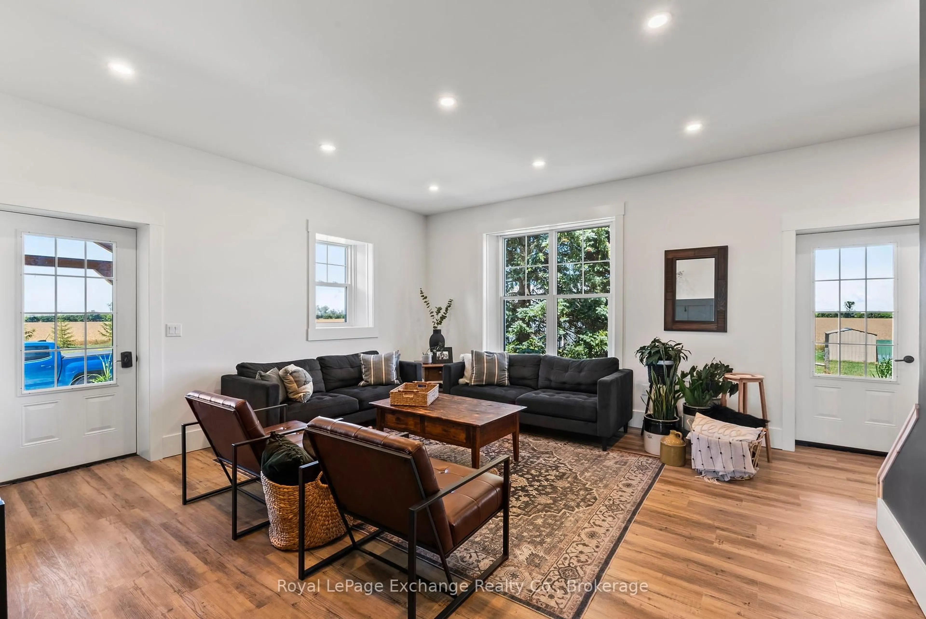 Living room with furniture, wood/laminate floor for 1165 Sideroad 30 Sdrd, Huron-Kinloss Ontario N0G 2R0