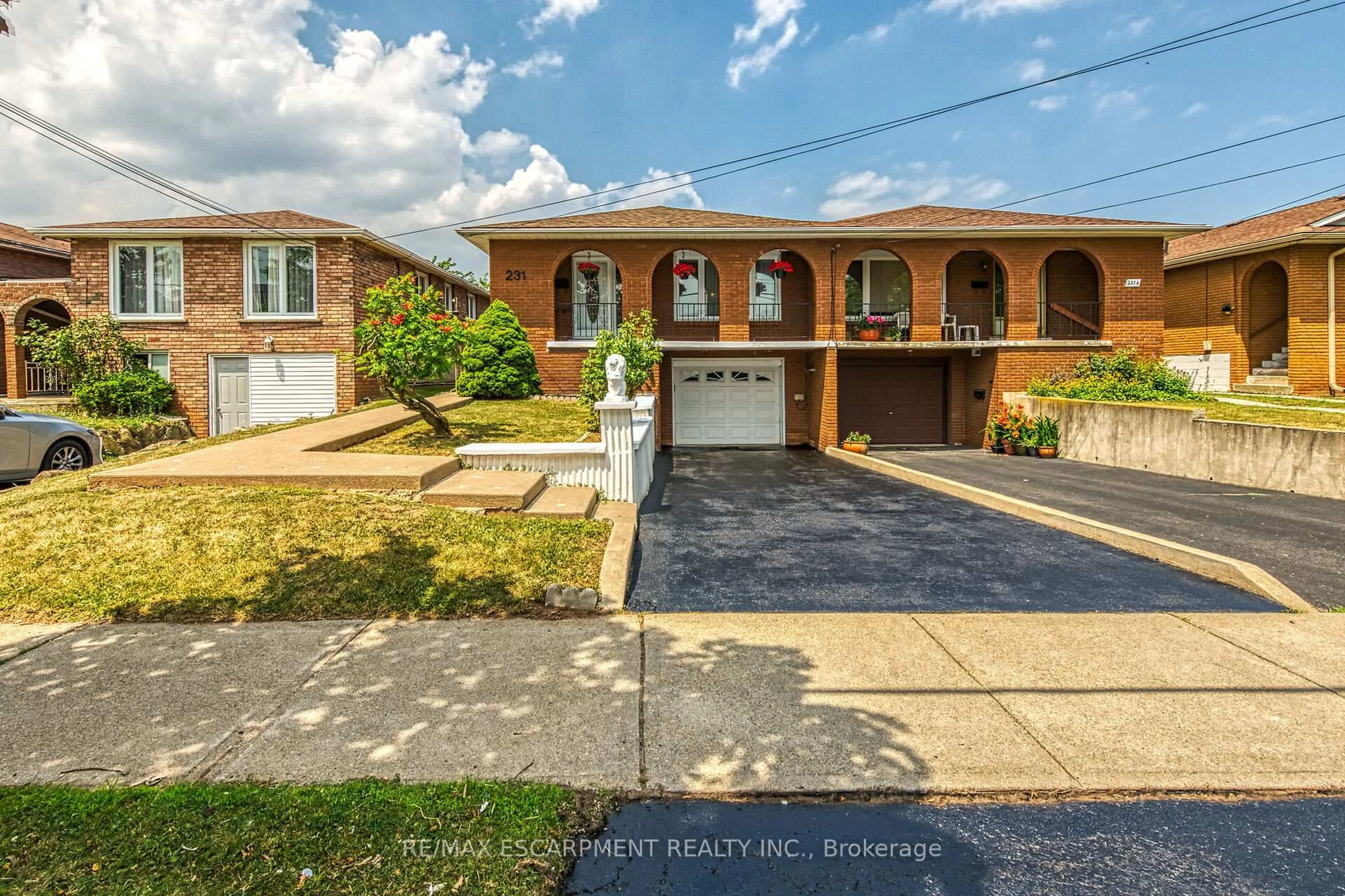 Home with brick exterior material, street for 231 Green Rd, Hamilton Ontario L8E 3J5