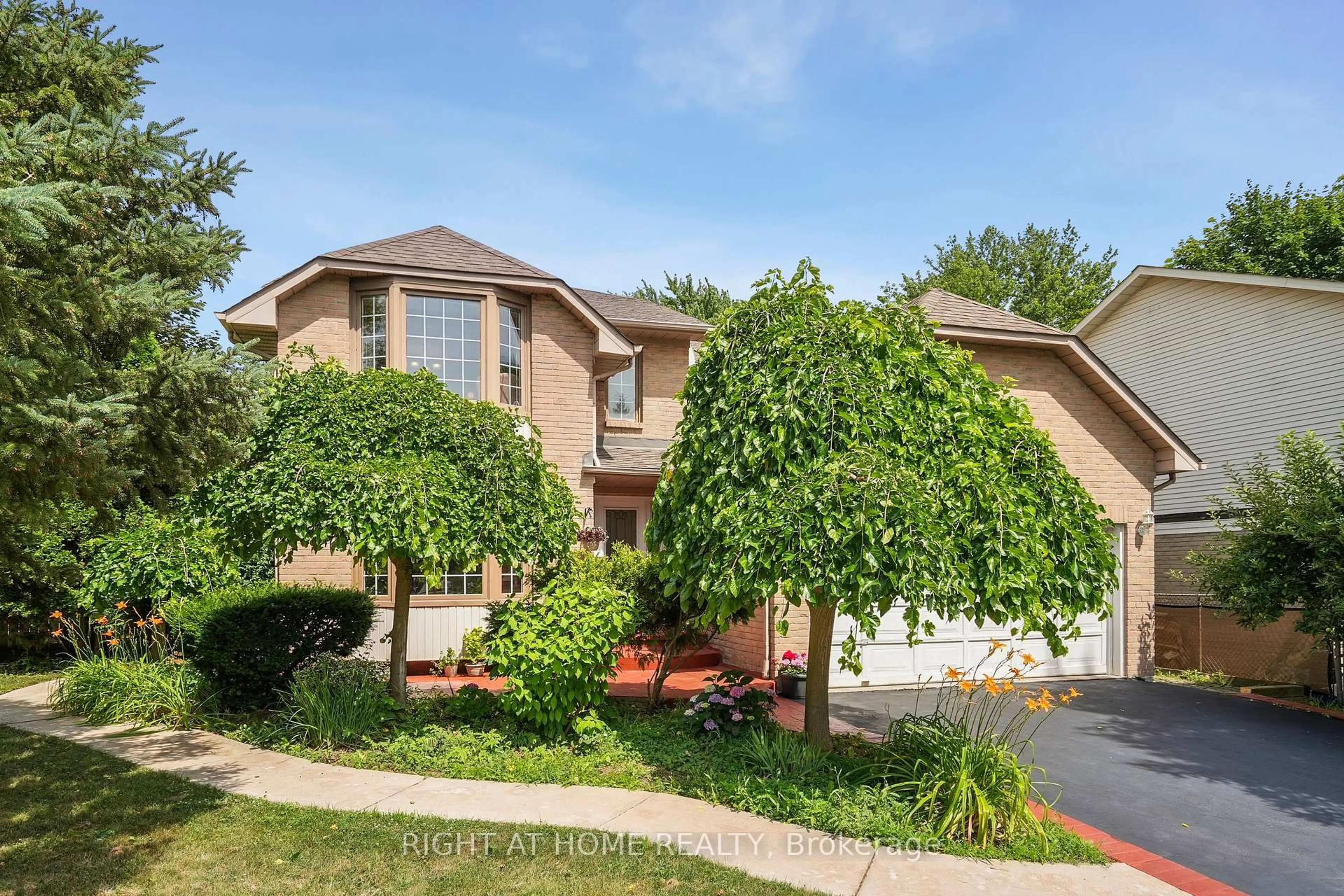 Home with brick exterior material, street for 309 Amberly Blvd, Hamilton Ontario L9G 4B6