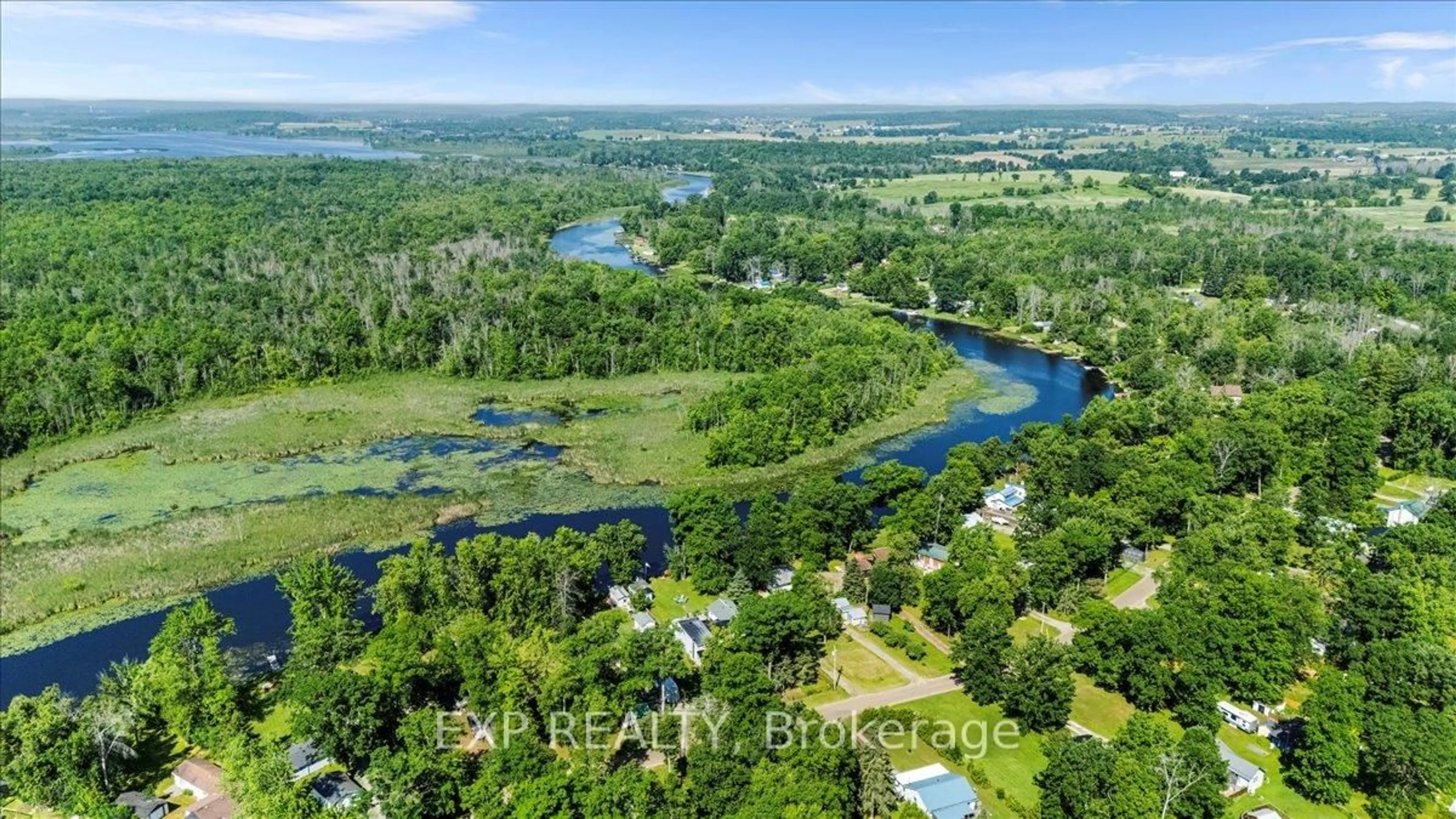 A pic from outside/outdoor area/front of a property/back of a property/a pic from drone, water/lake/river/ocean view for 233 River Rd, Trent Hills Ontario K0L 1L0