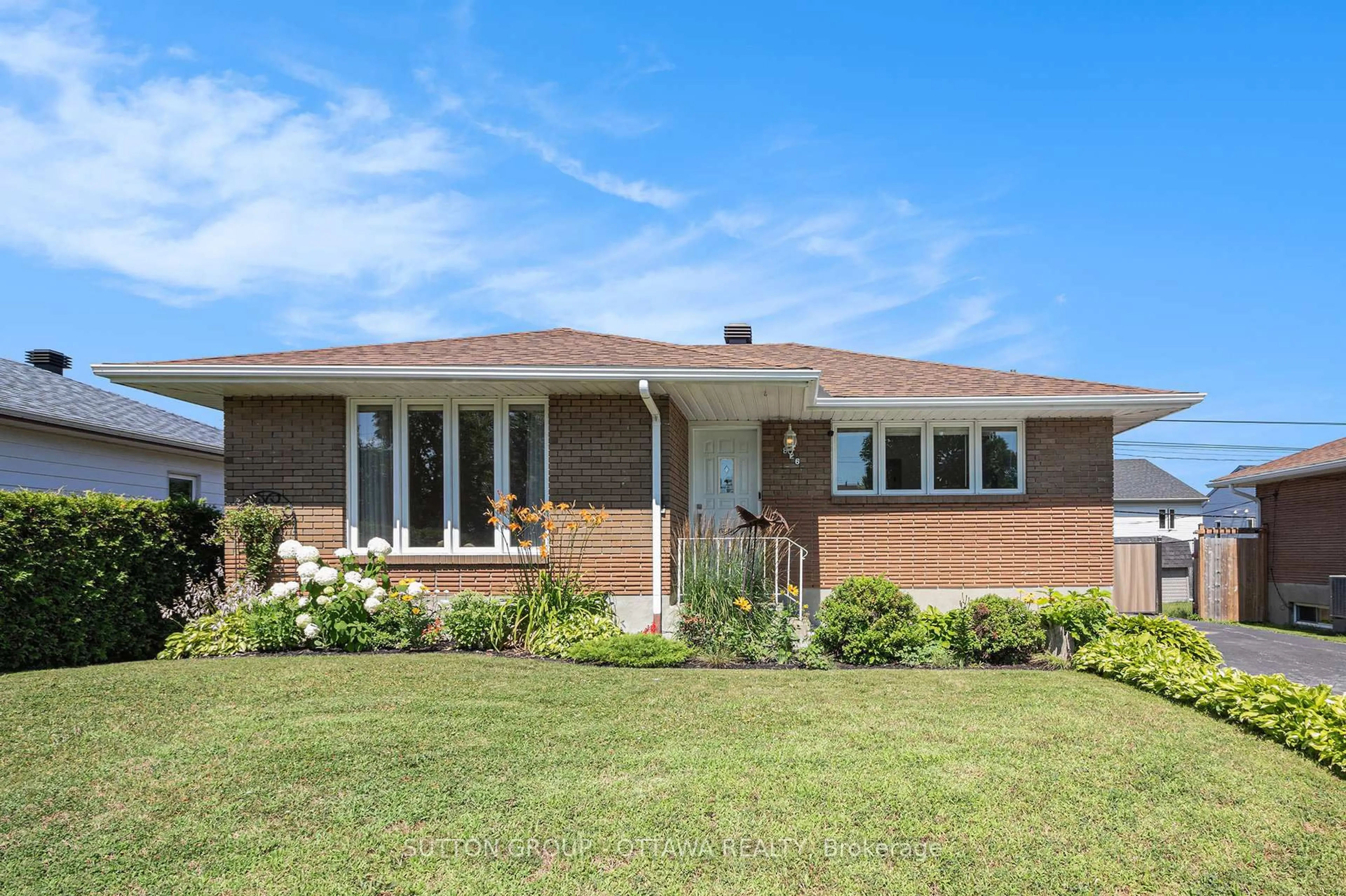 Home with brick exterior material, street for 826 Cartier Blvd, Hawkesbury Ontario K6A 1W7