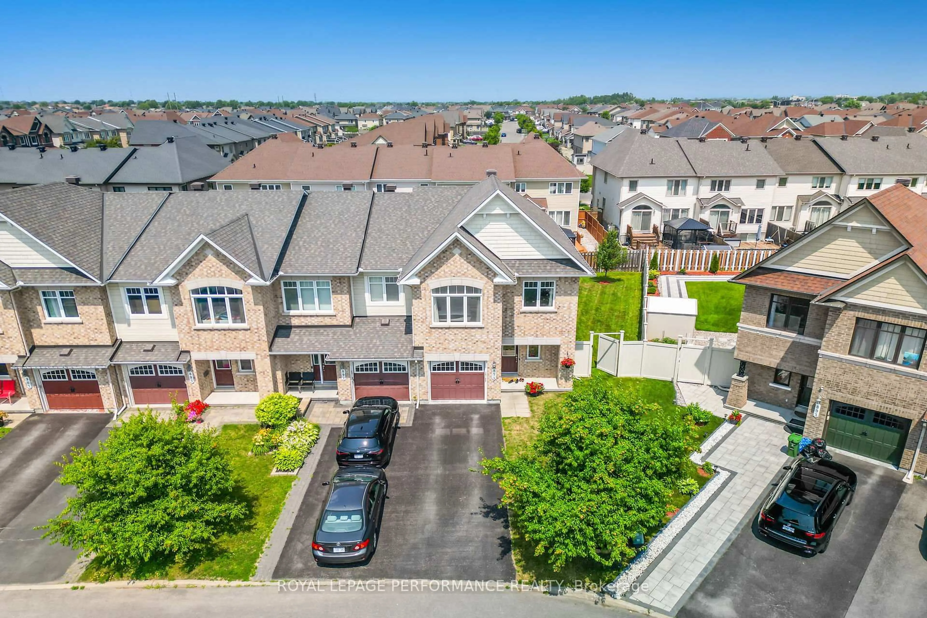 A pic from outside/outdoor area/front of a property/back of a property/a pic from drone, unknown for 895 Ashenvale Way, Ottawa Ontario K4A 0R8