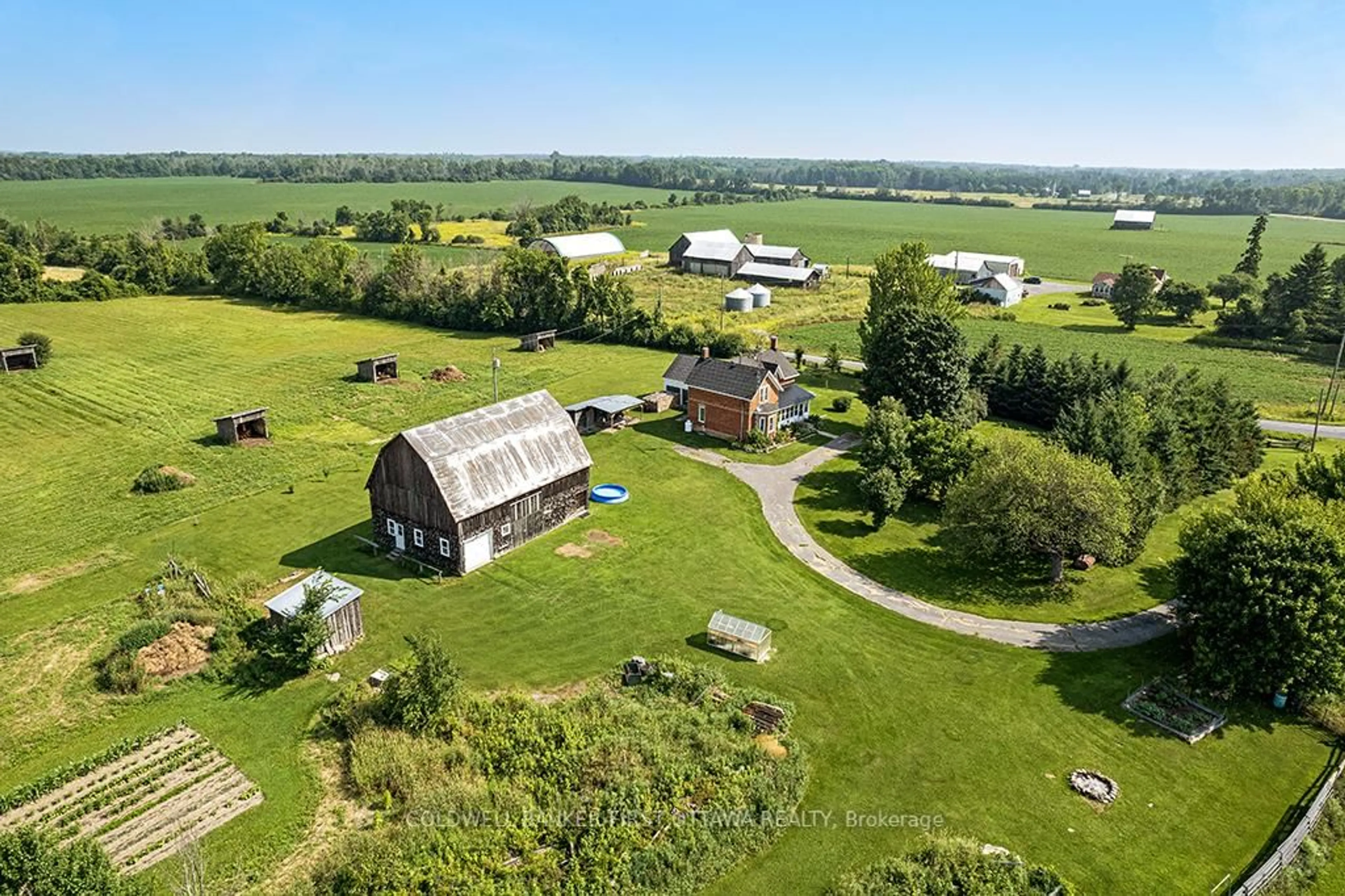 A pic from outside/outdoor area/front of a property/back of a property/a pic from drone, mountain view for 453 Day Rd, Perth Ontario K7H 3C3