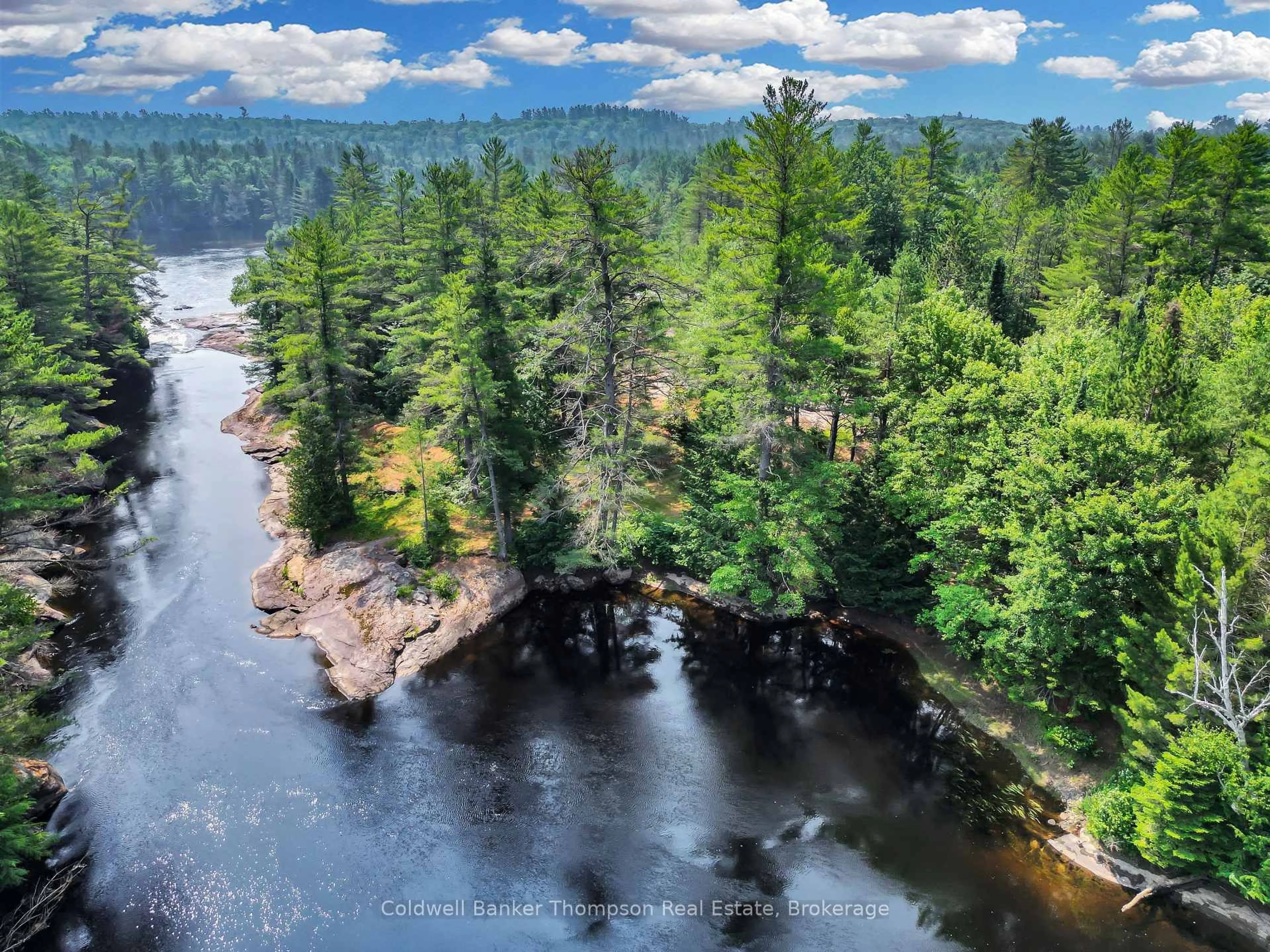 A pic from outside/outdoor area/front of a property/back of a property/a pic from drone, water/lake/river/ocean view for 1111 Alpine Ranch  Pvt Rd, Bracebridge Ontario P1L 1T8