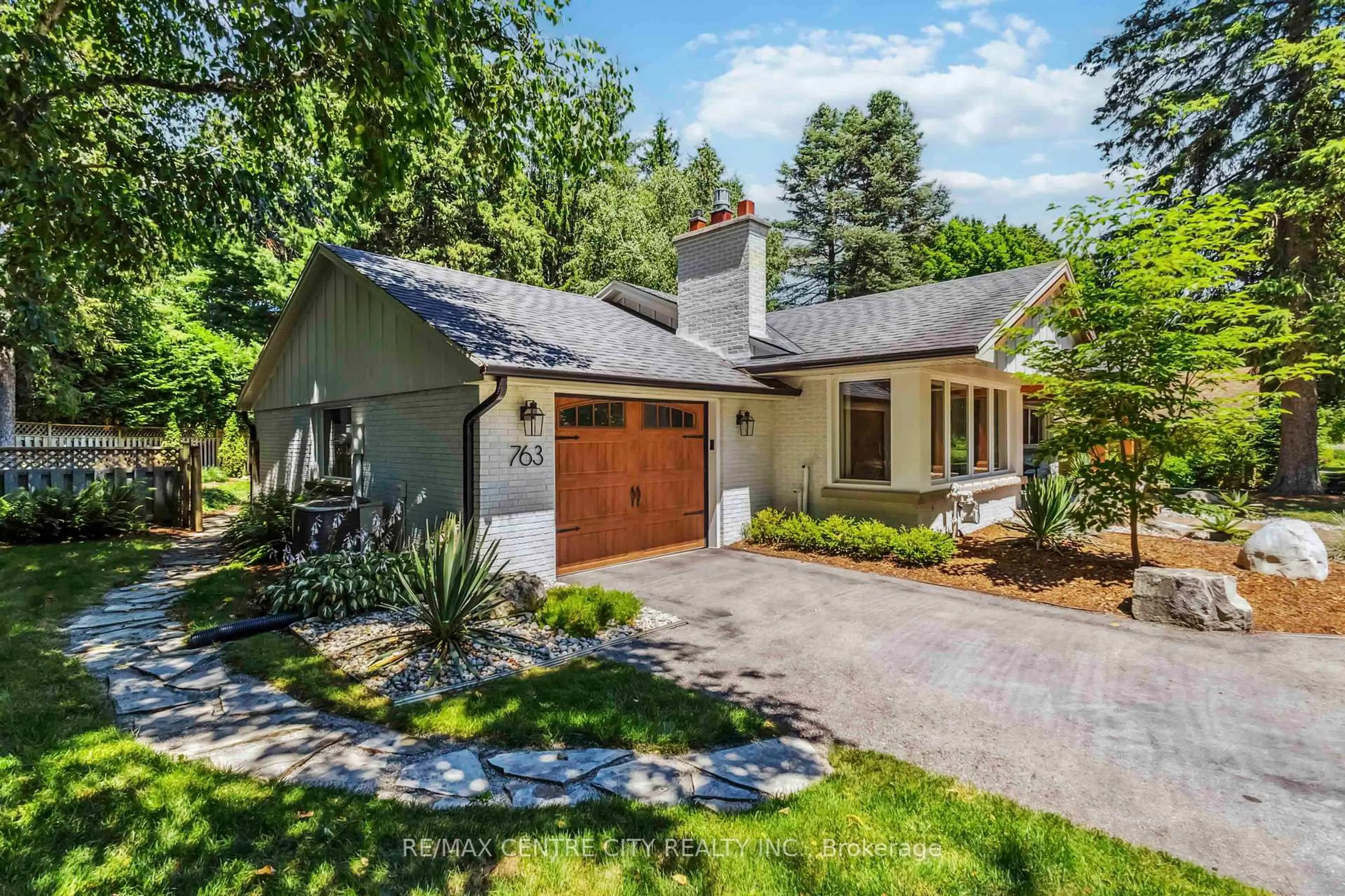 Home with brick exterior material, street for 763 Green Lane, London North Ontario N6H 2T9