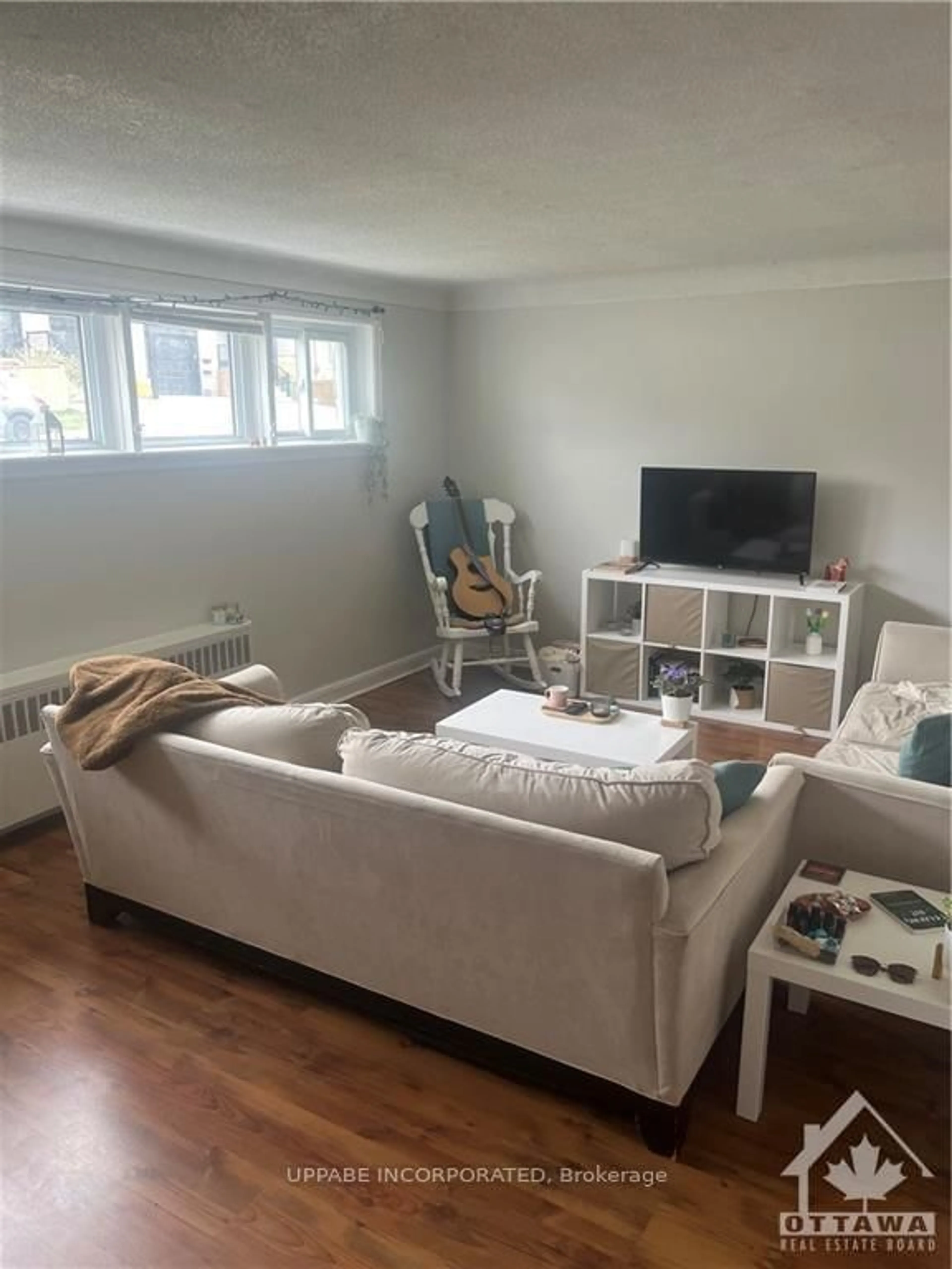 Living room with furniture, unknown for 382 Brant St, Ottawa Ontario K1L 6V6
