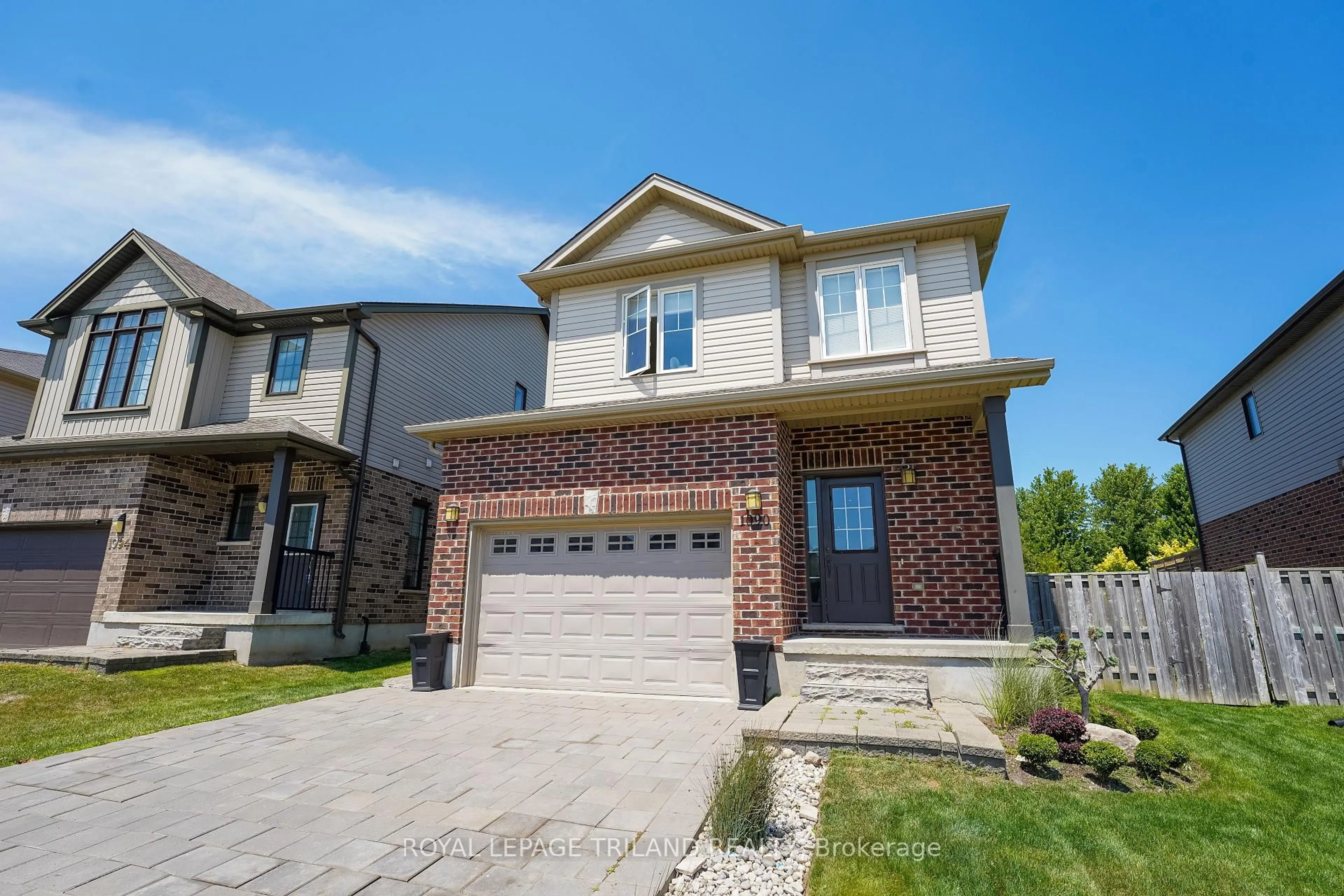 Home with brick exterior material, street for 1090 Oakcrossing Rd, London North Ontario N6H 0E9
