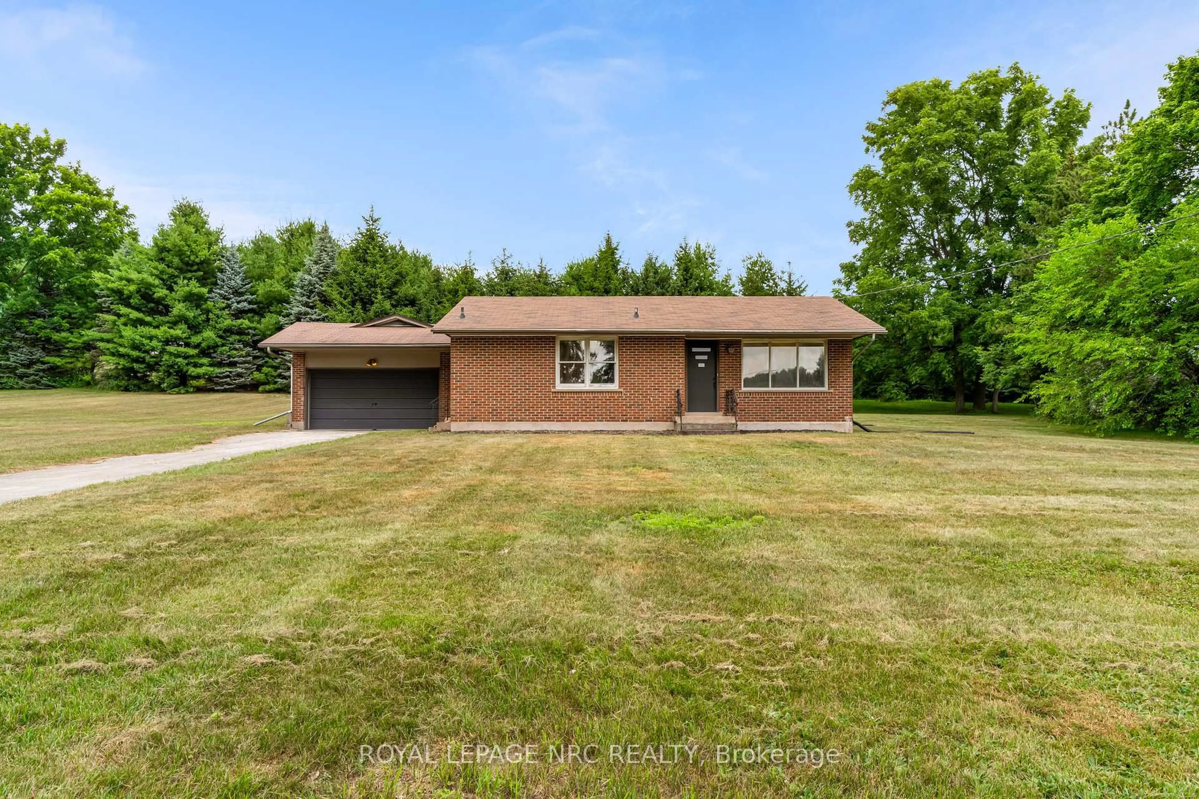 Home with brick exterior material, street for 489 Memorial Dr, Pelham Ontario L0S 1C0