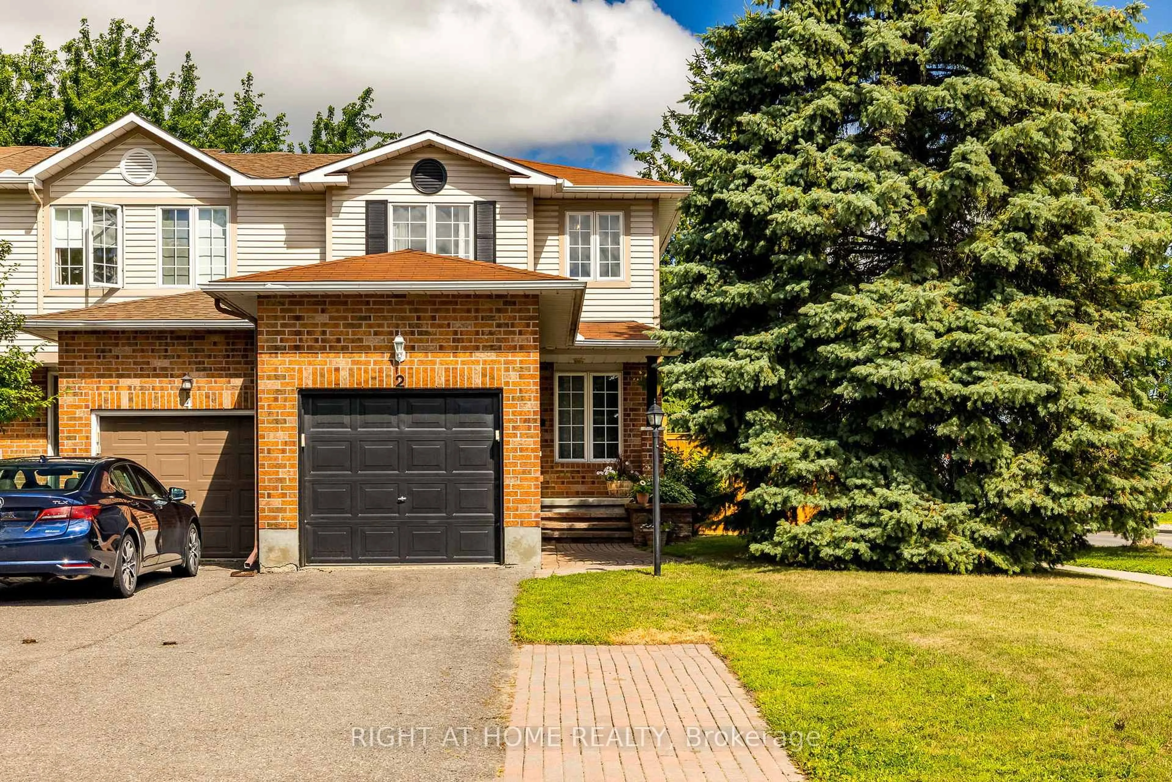 Home with brick exterior material, street for 2 Whalings Circ, Stittsville Ontario K2S 1S4