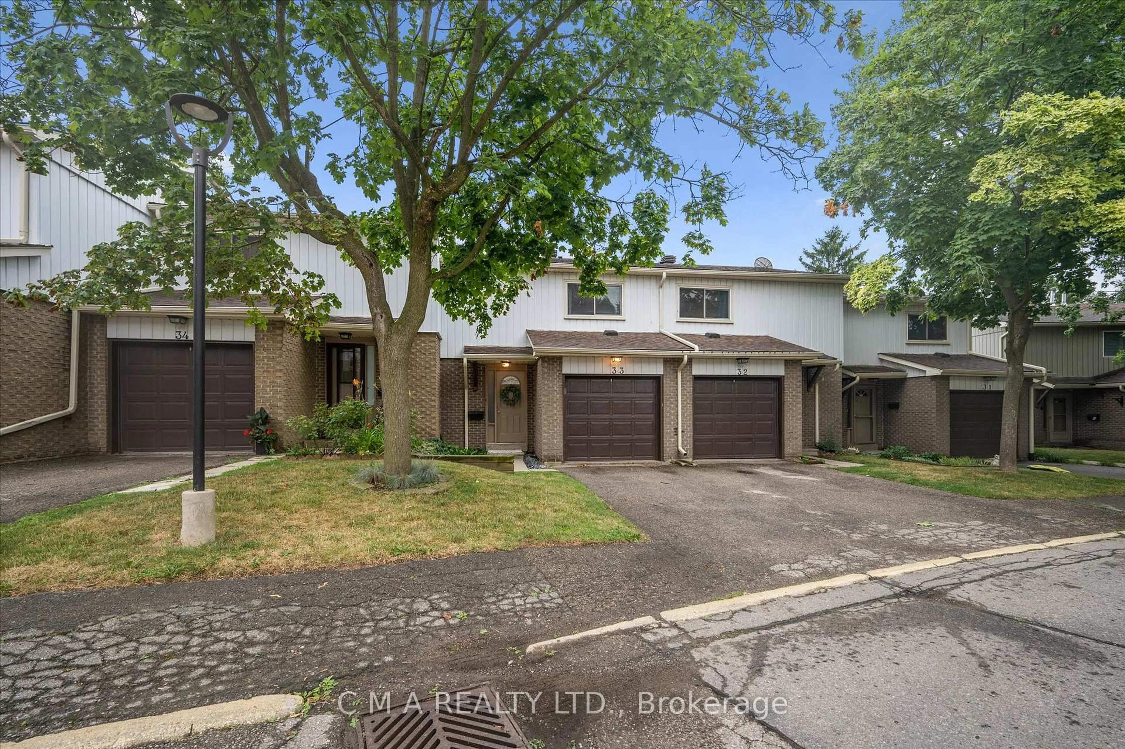 A pic from outside/outdoor area/front of a property/back of a property/a pic from drone, street for 51 Paulander Dr #33, Kitchener Ontario N2M 5E5