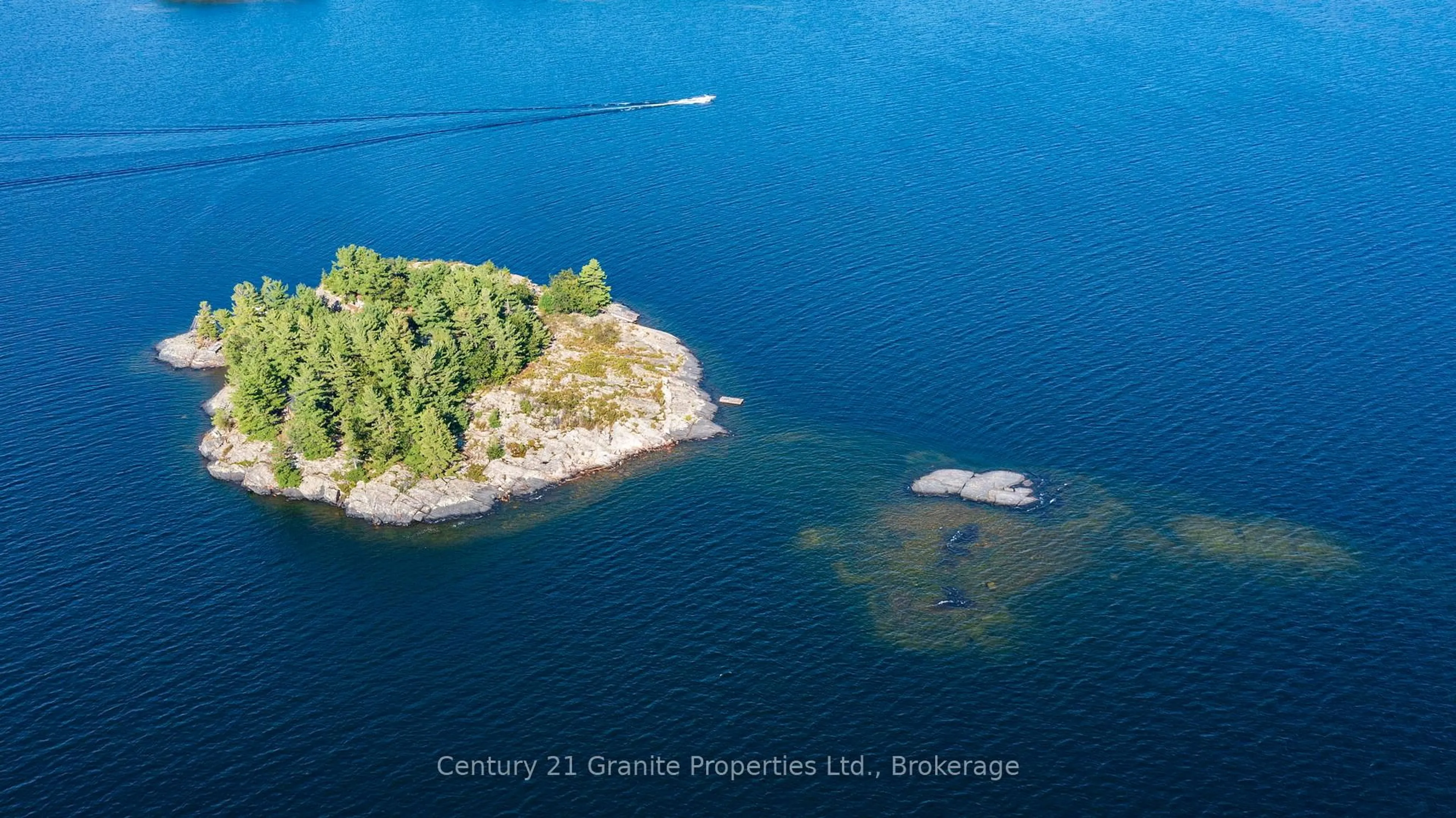 A pic from outside/outdoor area/front of a property/back of a property/a pic from drone, water/lake/river/ocean view for 1 PARTRIDGE ISLAND, McDougall Ontario P0G 1G0