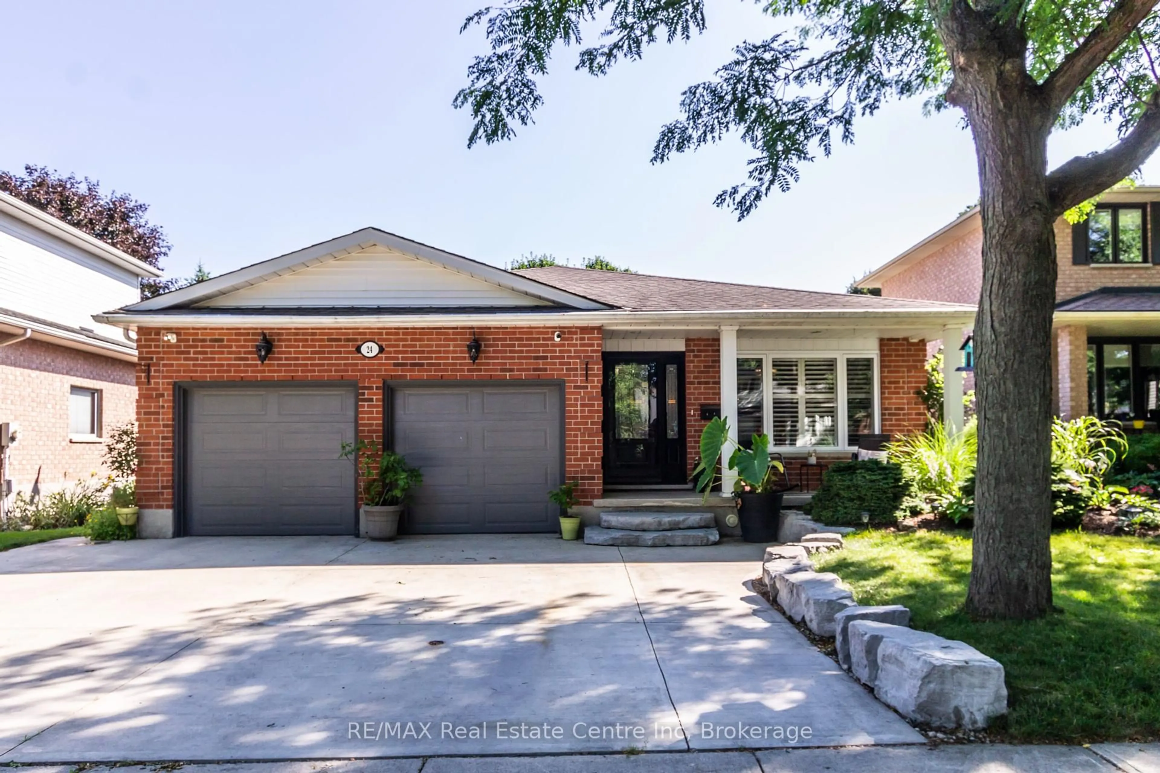 Home with brick exterior material, street for 24 Darby Rd, Guelph Ontario N1K 1R4