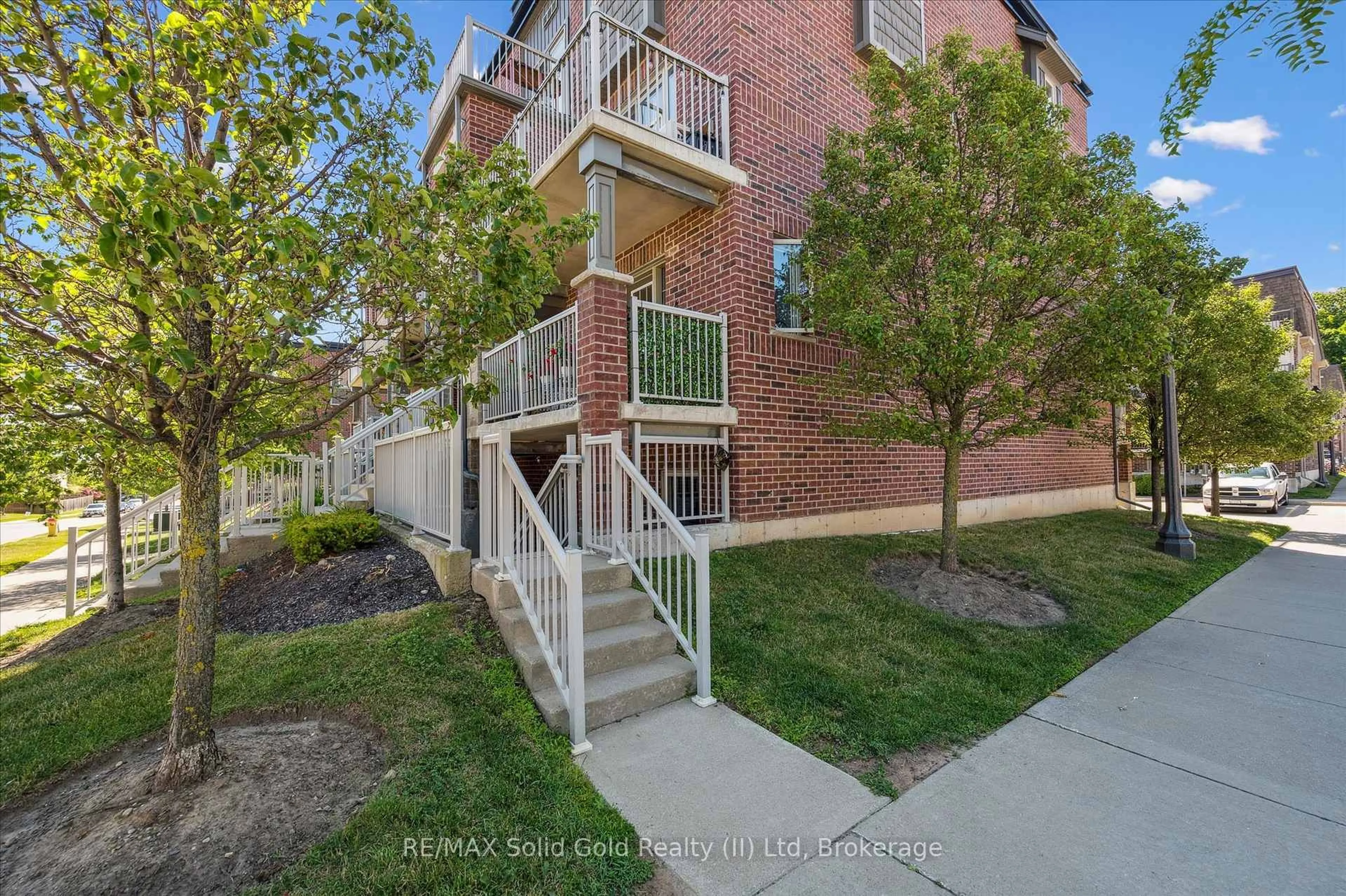 A pic from outside/outdoor area/front of a property/back of a property/a pic from drone, street for 20 Sienna St #D, Kitchener Ontario N2R 0H6