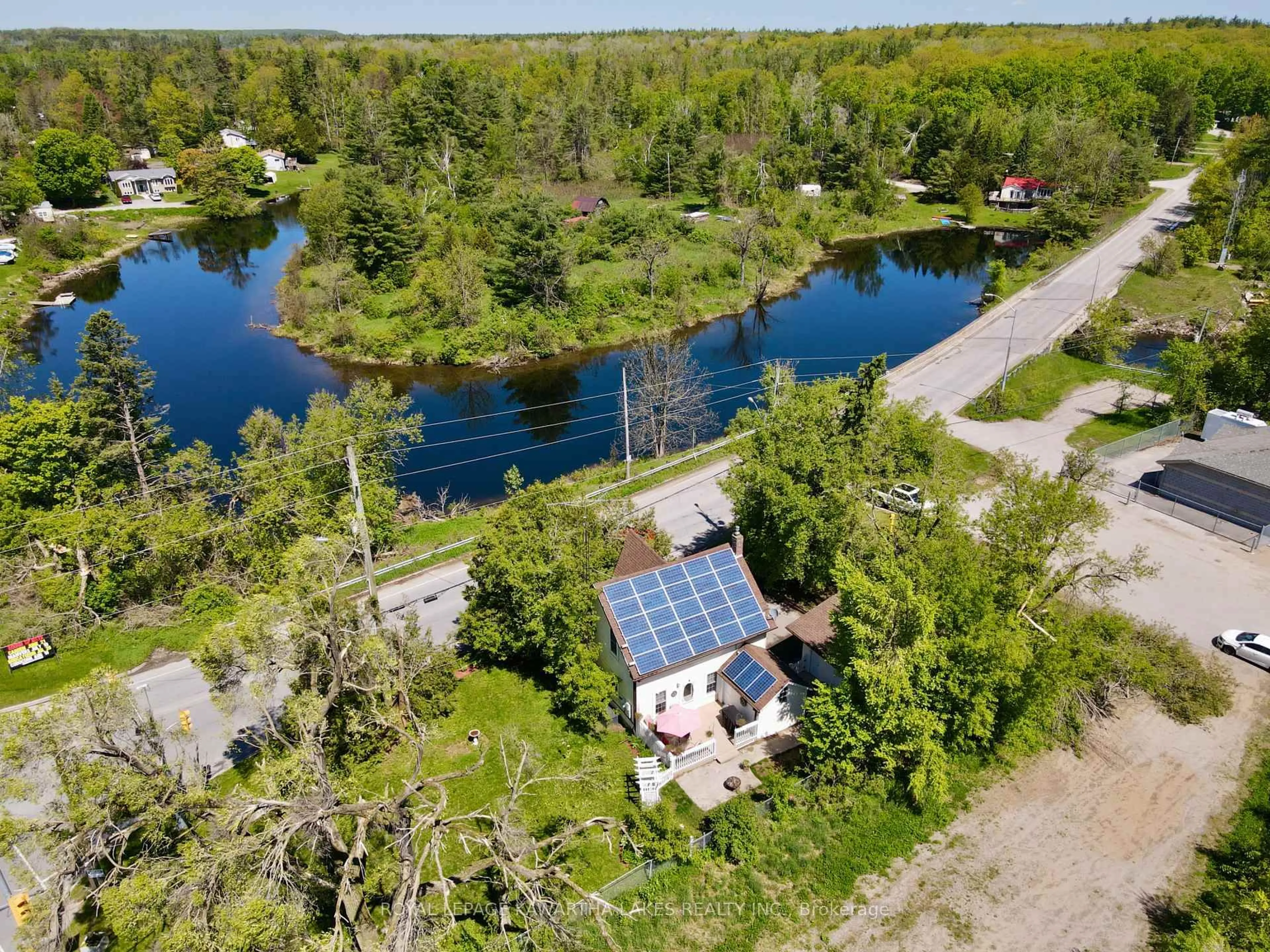 A pic from outside/outdoor area/front of a property/back of a property/a pic from drone, water/lake/river/ocean view for 3472 Monck Rd, Kawartha Lakes Ontario K0M 1K0