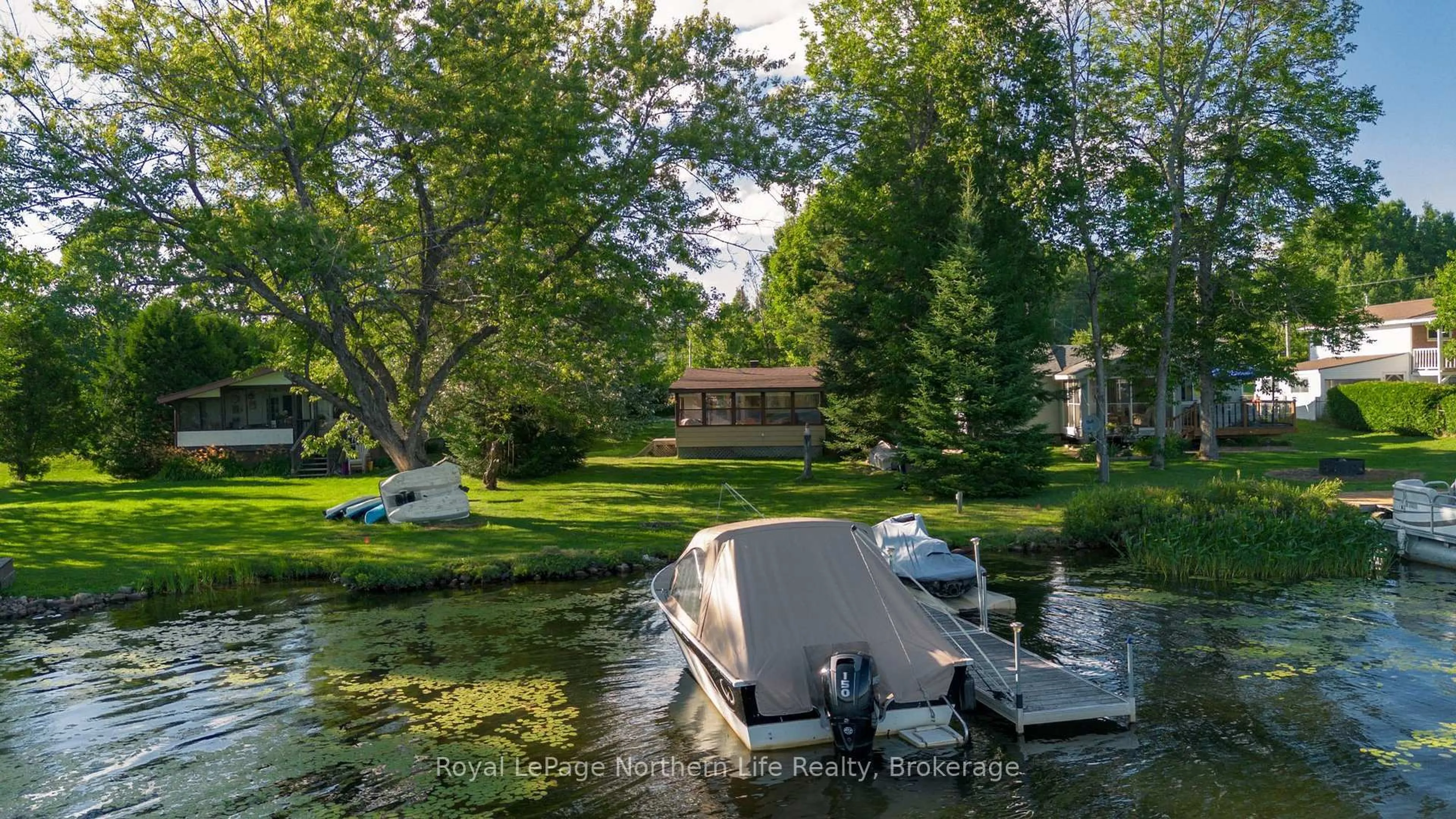 A pic from outside/outdoor area/front of a property/back of a property/a pic from drone, water/lake/river/ocean view for 308 MARTINDALE Lane, Bonfield Ontario P0H 1E0